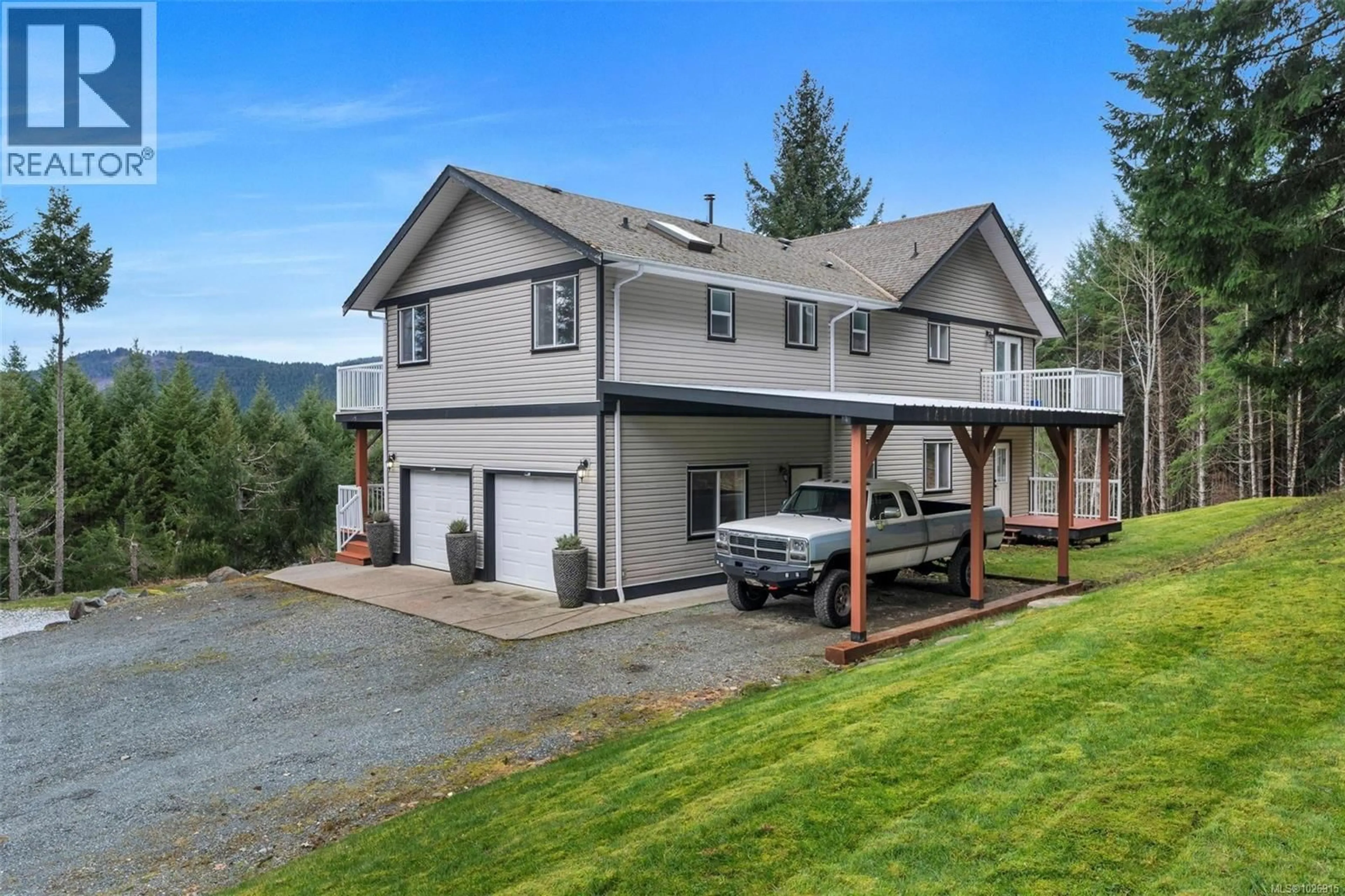A pic from outside/outdoor area/front of a property/back of a property/a pic from drone, unknown for 1130 COUGAR RIDGE ROAD, Shawnigan Lake British Columbia V8H2C2