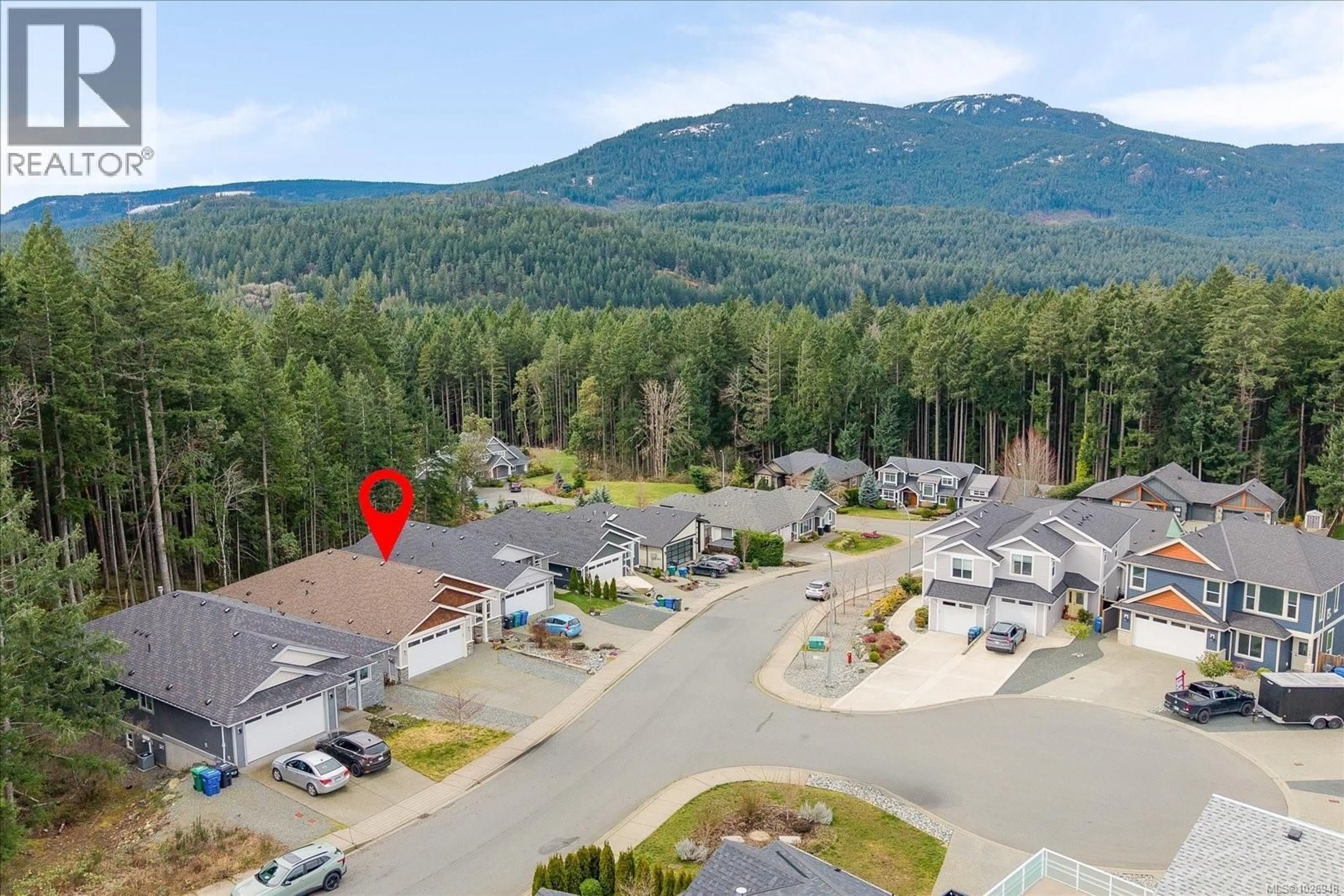 A pic from outside/outdoor area/front of a property/back of a property/a pic from drone, mountain view for 1335 LANGARA DRIVE, Nanaimo British Columbia V9R6A8