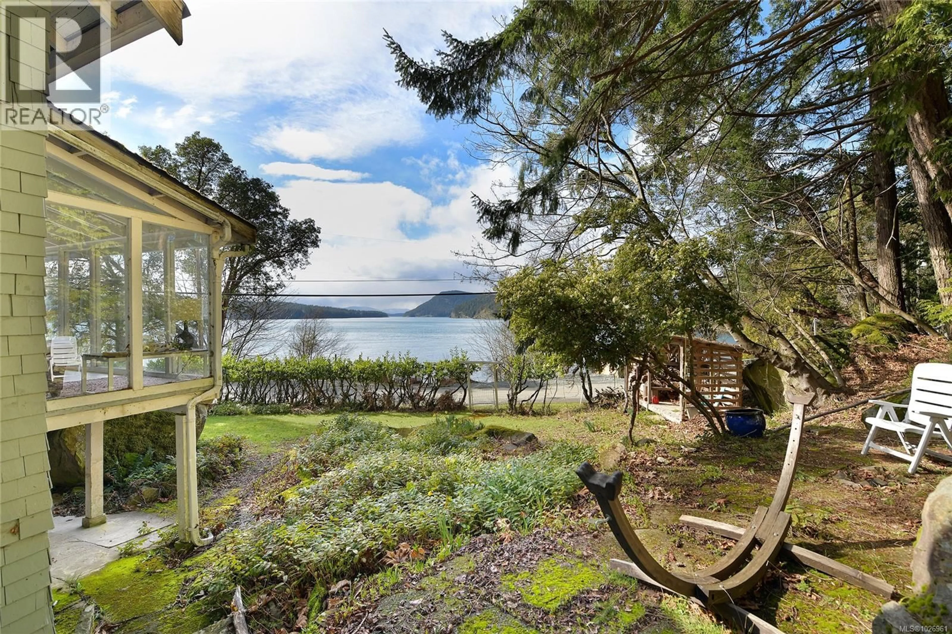 A pic from outside/outdoor area/front of a property/back of a property/a pic from drone, water/lake/river/ocean view for 348 GEORGINA POINT ROAD, Mayne Island British Columbia V0N2J1