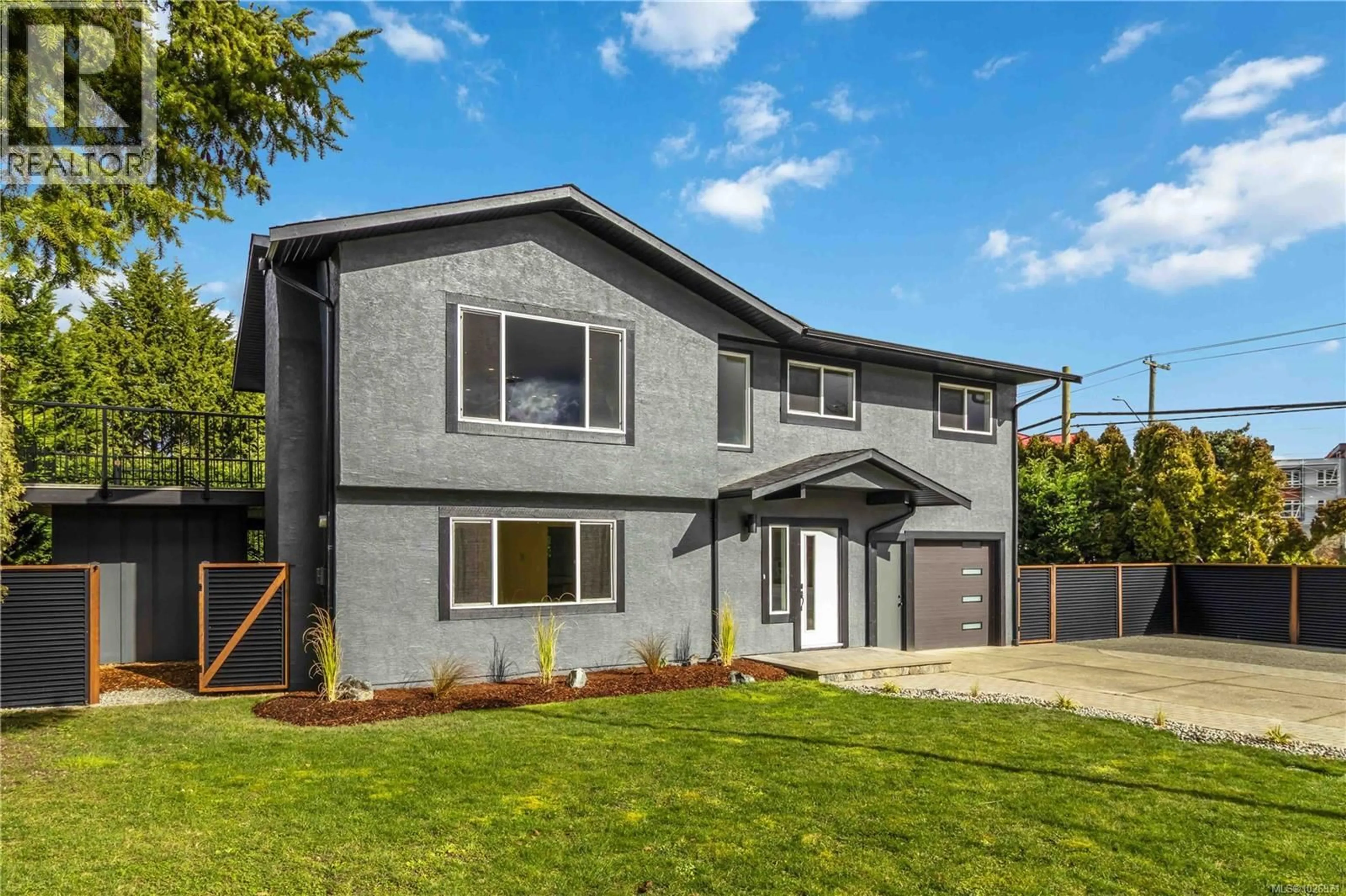 Home with vinyl exterior material, street for 1964 GENOA PLACE, Central Saanich British Columbia V8M1M1