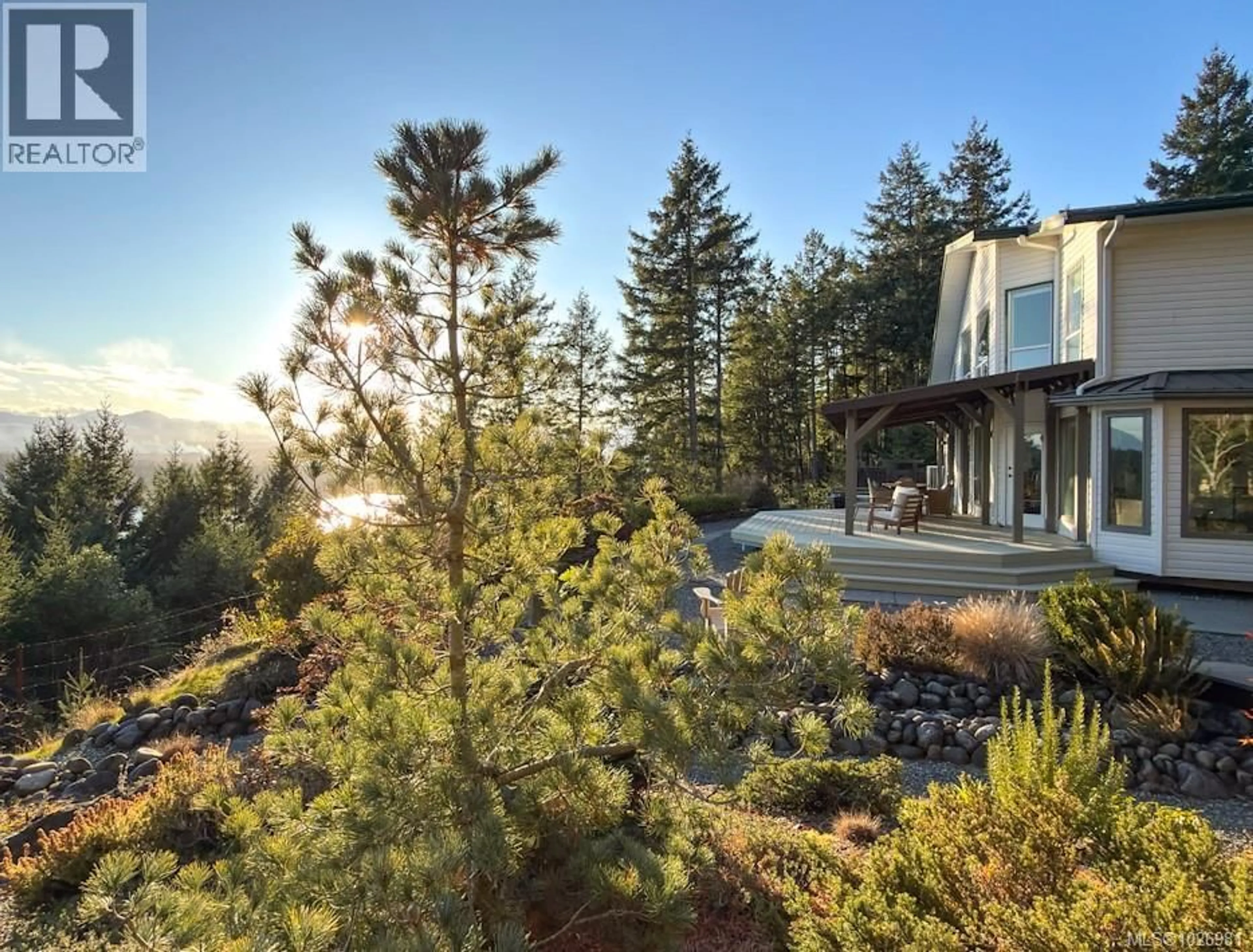 A pic from outside/outdoor area/front of a property/back of a property/a pic from drone, forest/trees view for 1115 COATS DRIVE, Gabriola Island British Columbia V0R1X4