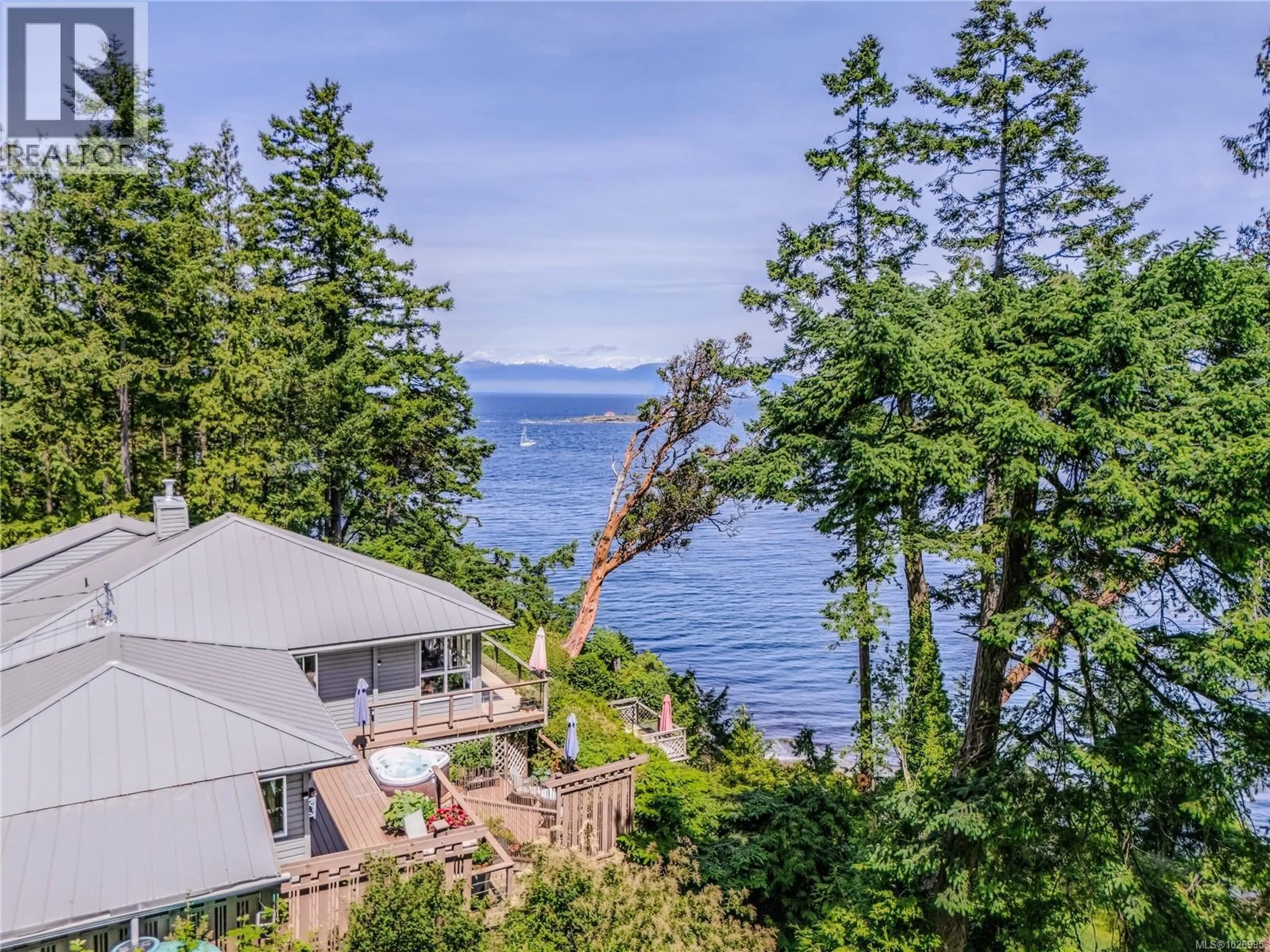 A pic from outside/outdoor area/front of a property/back of a property/a pic from drone, water/lake/river/ocean view for 1130 BERRY POINT ROAD, Gabriola Island British Columbia V0R1X1