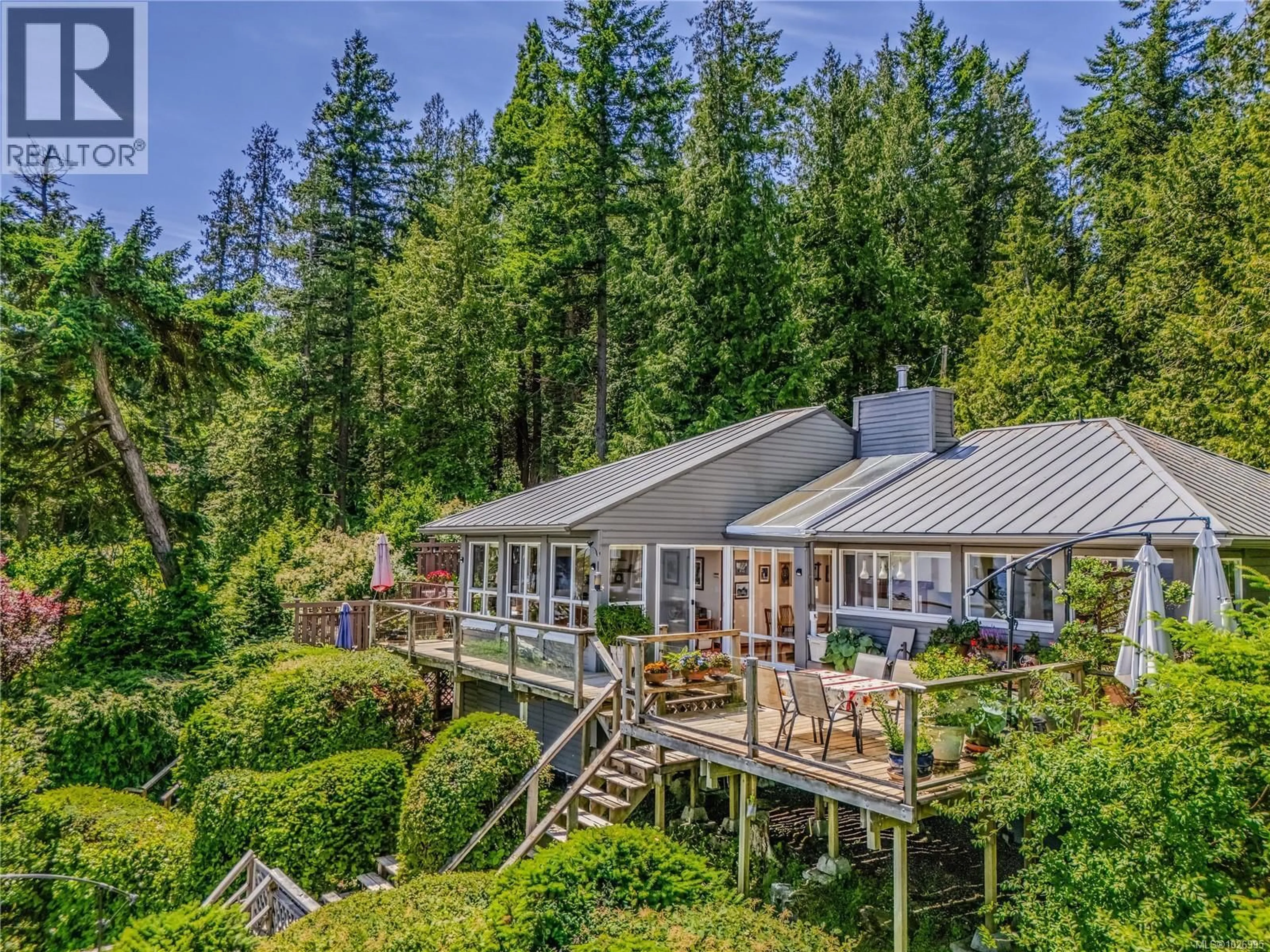 A pic from outside/outdoor area/front of a property/back of a property/a pic from drone, forest/trees view for 1130 BERRY POINT ROAD, Gabriola Island British Columbia V0R1X1