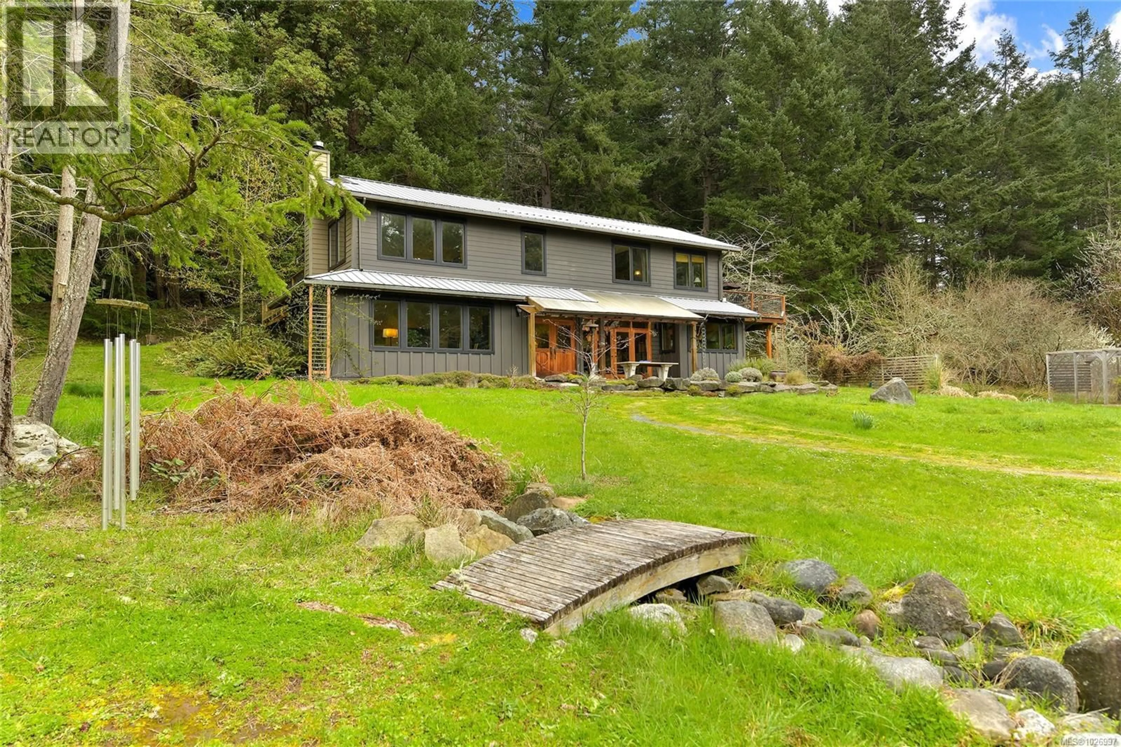 A pic from outside/outdoor area/front of a property/back of a property/a pic from drone, unknown for 594 HORTON BAY ROAD, Mayne Island British Columbia V0N2J2