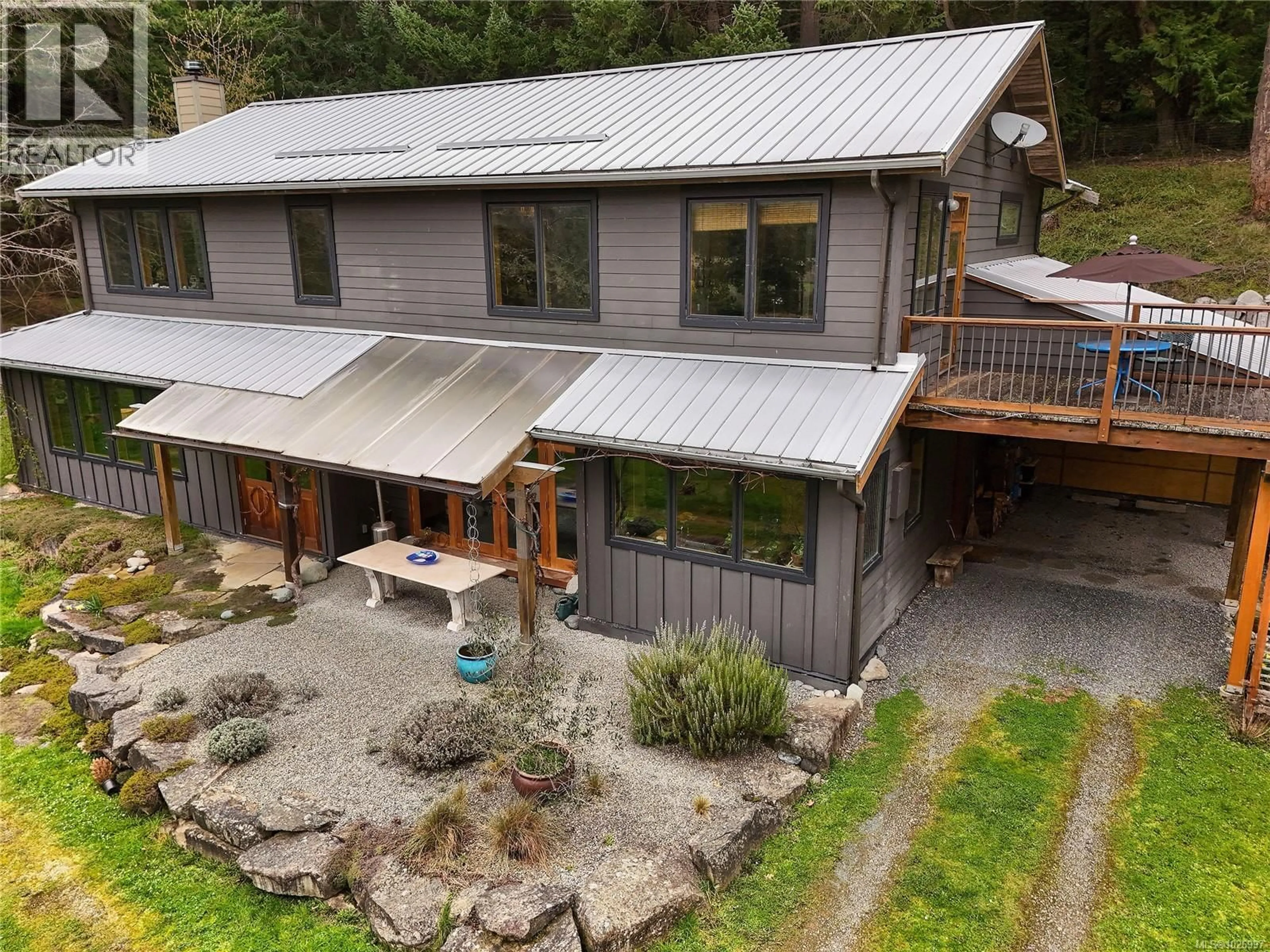 A pic from outside/outdoor area/front of a property/back of a property/a pic from drone, building for 594 HORTON BAY ROAD, Mayne Island British Columbia V0N2J2
