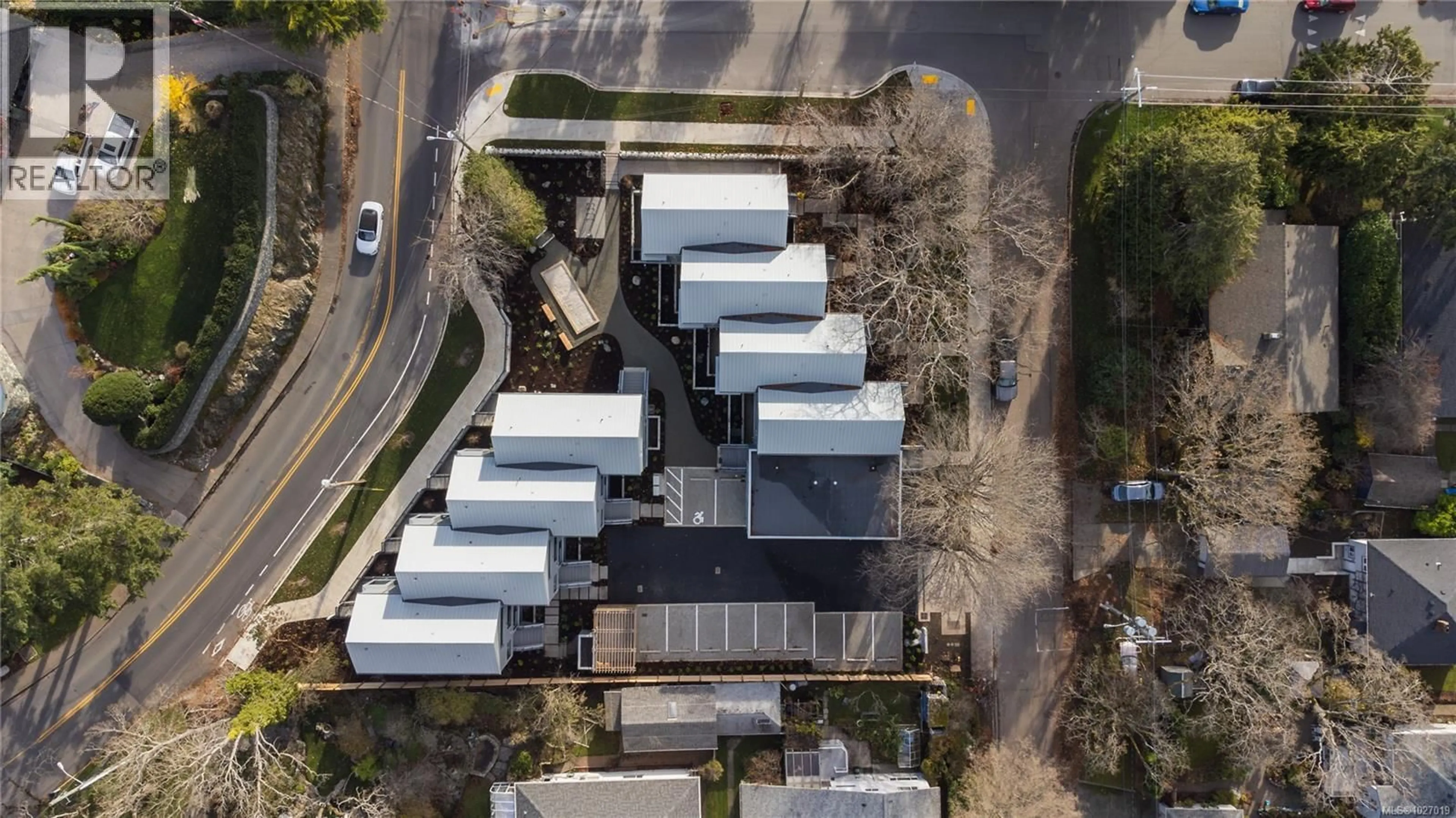 A pic from outside/outdoor area/front of a property/back of a property/a pic from drone, street for 2 - 909 REDFERN ROAD, Victoria British Columbia V8S4H8