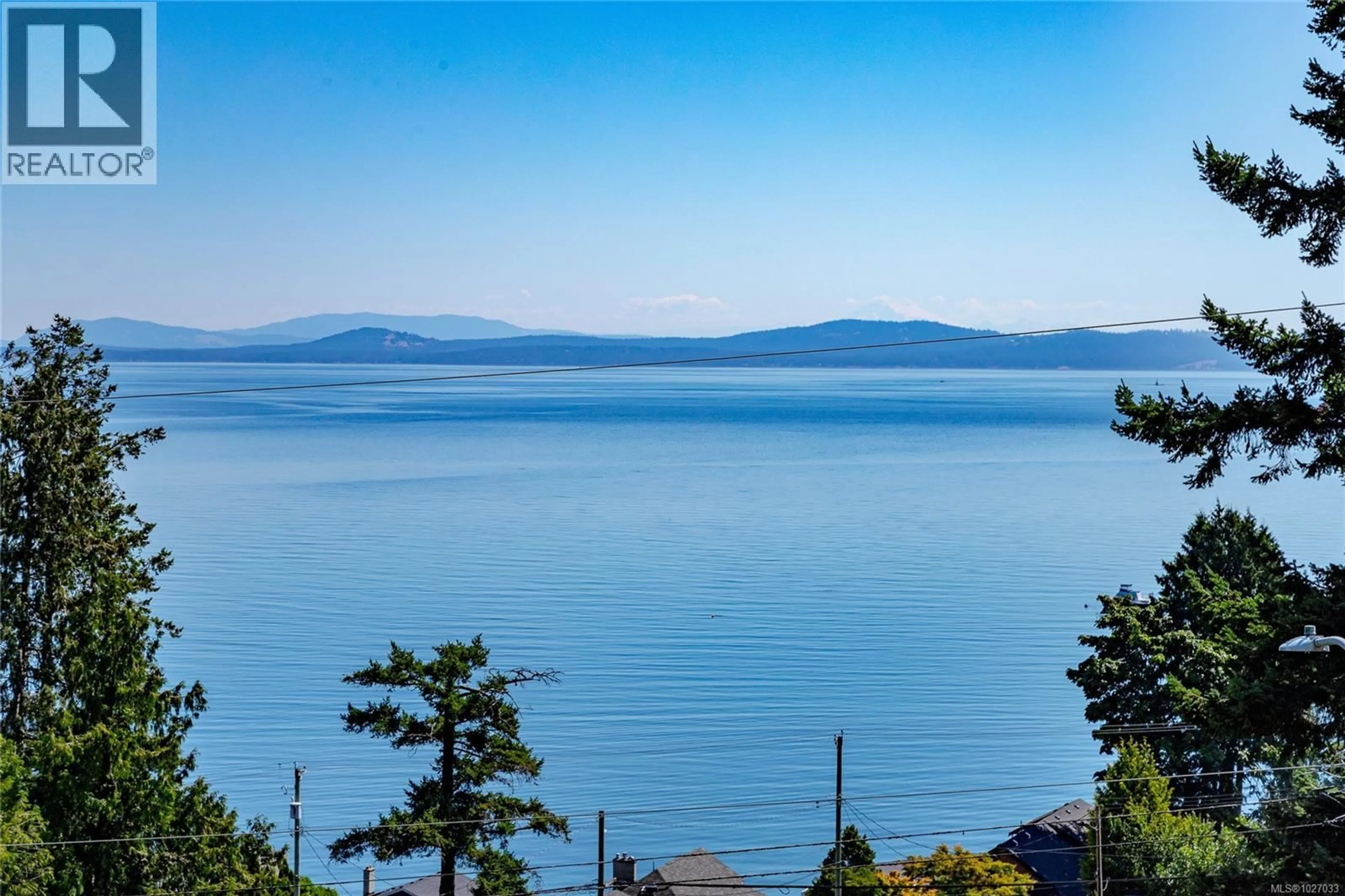 A pic from outside/outdoor area/front of a property/back of a property/a pic from drone, water/lake/river/ocean view for 4964 LOCHSIDE DRIVE, Saanich British Columbia V8Y2E4