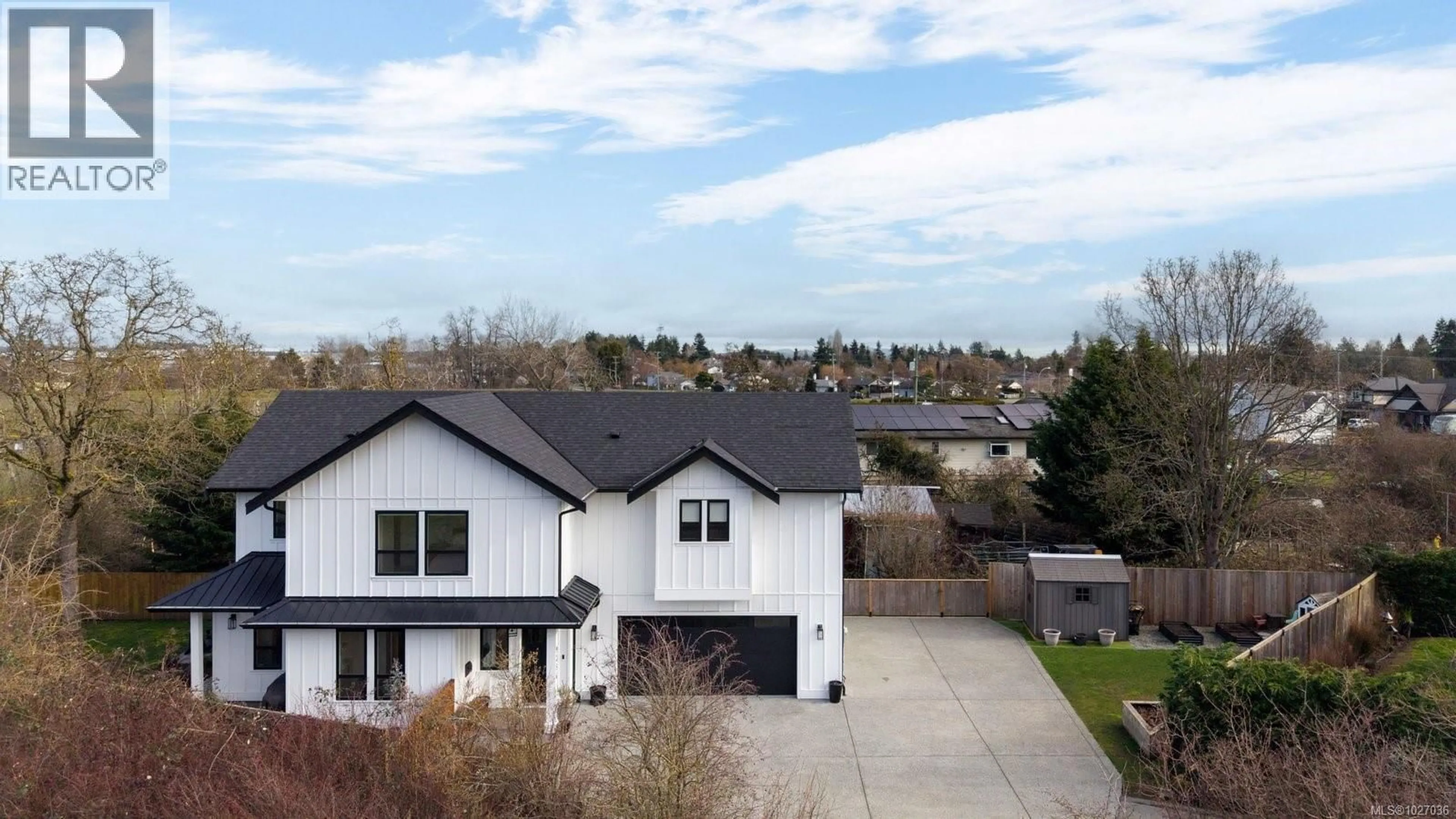 A pic from outside/outdoor area/front of a property/back of a property/a pic from drone, street for 9356 EAST SAANICH ROAD, North Saanich British Columbia V8L1H9