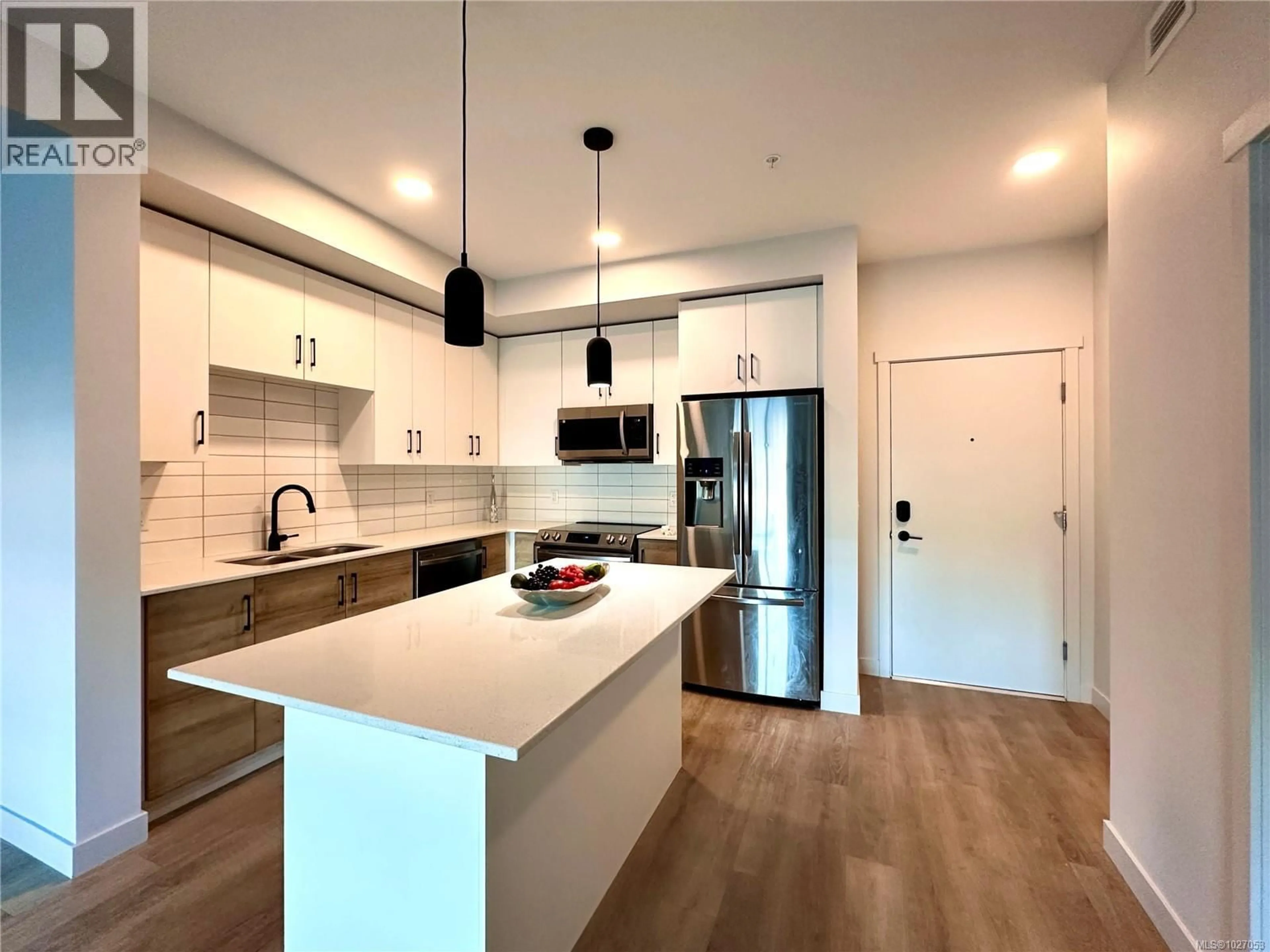 Open concept kitchen, unknown for 210 - 2465 GATEWAY ROAD, Langford British Columbia V9B6R1