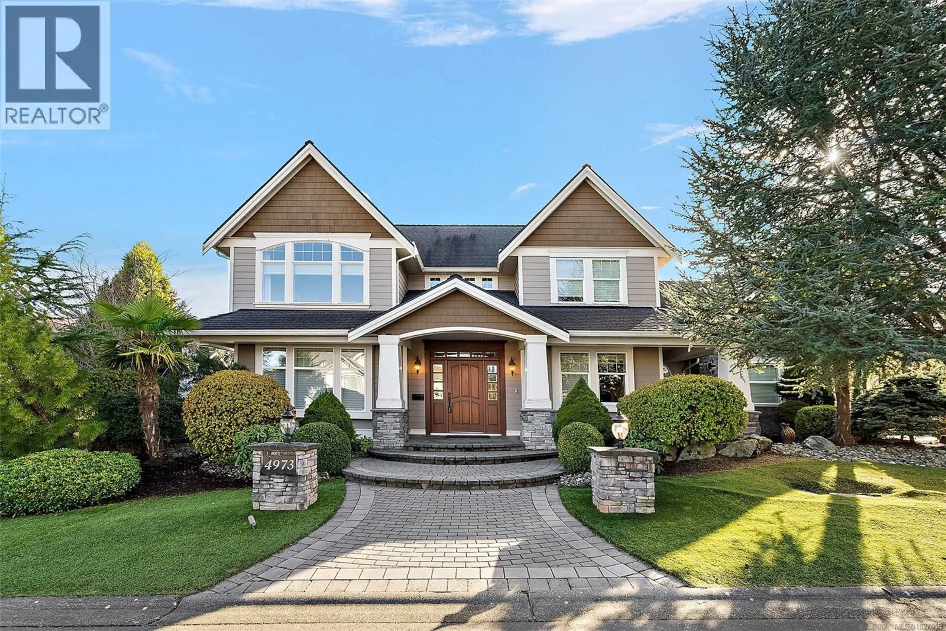 Home with brick exterior material, street for 4973 LA QUINTA PLACE, Saanich British Columbia V8Y3G9