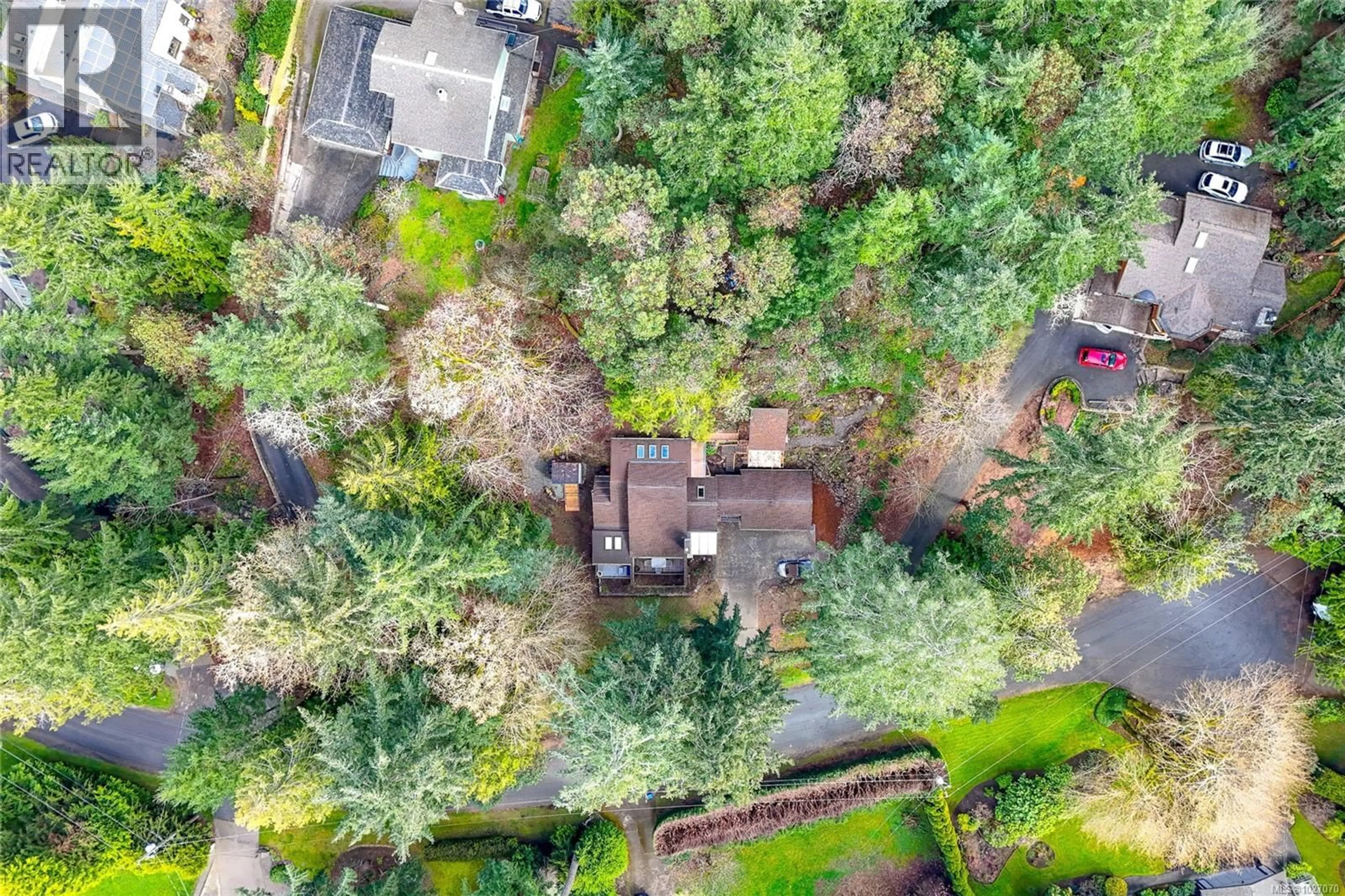 A pic from outside/outdoor area/front of a property/back of a property/a pic from drone, forest/trees view for 10912 BOAS ROAD, North Saanich British Columbia V8L5J1