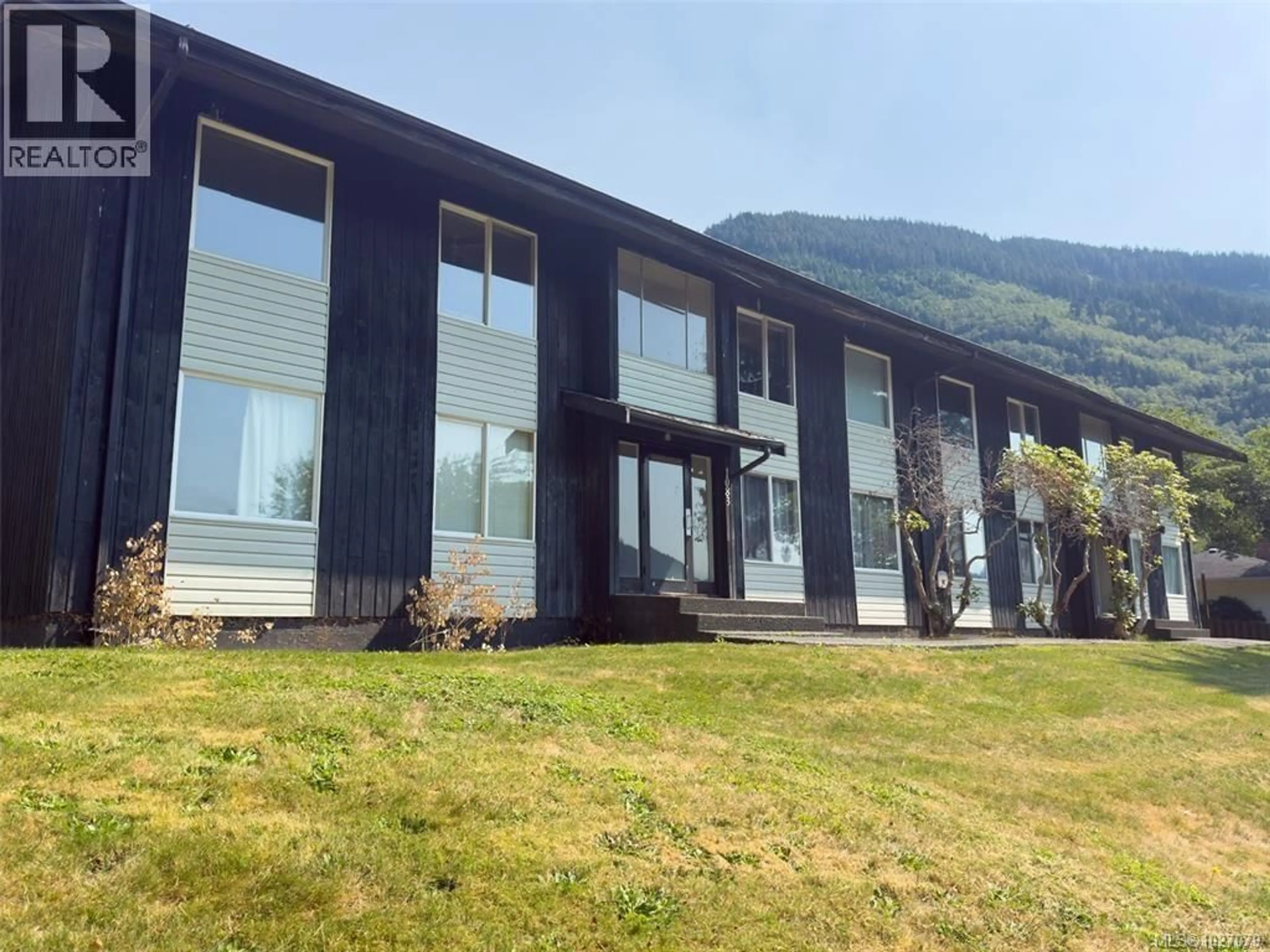 Home with vinyl exterior material, mountain view for 404 - 1083 MAQUINNA AVENUE, Port Alice British Columbia V0N2R0
