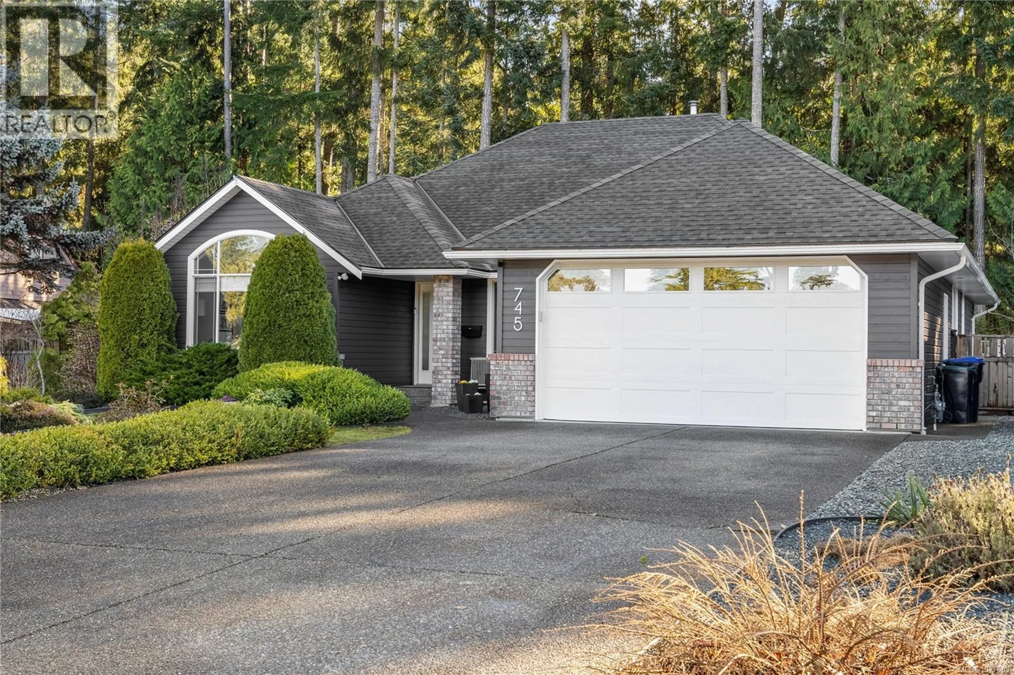 Home with vinyl exterior material, street for 745 REDWOOD DRIVE, Qualicum Beach British Columbia V9K2J2