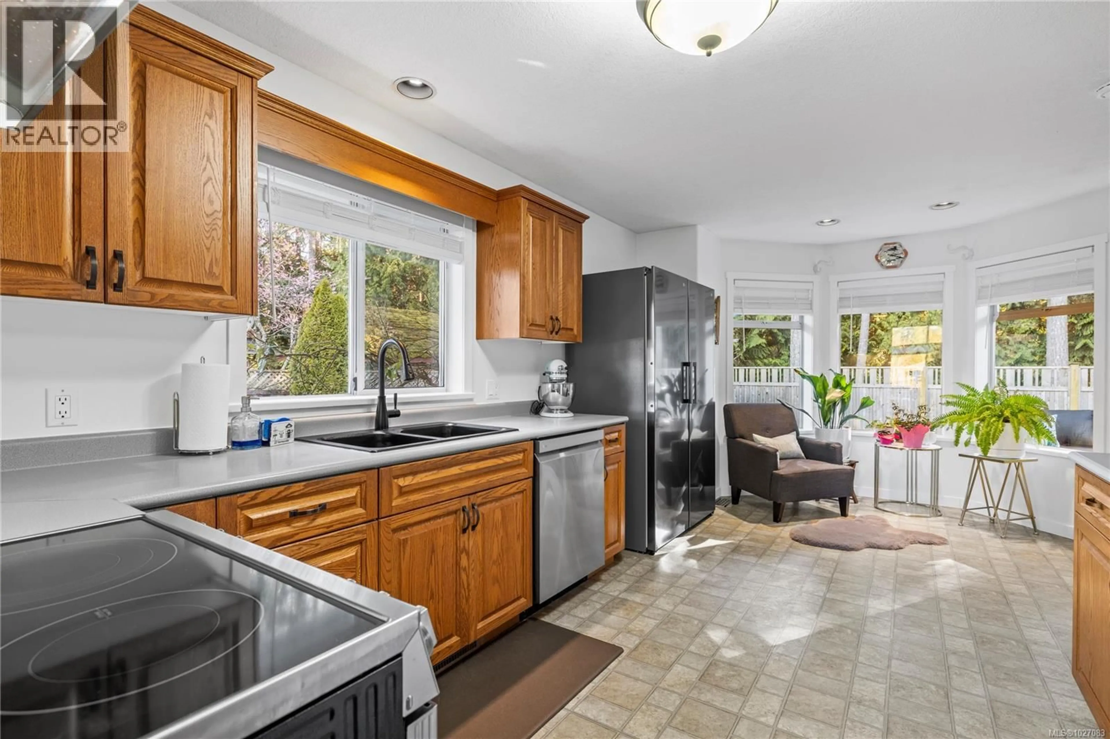 Open concept kitchen, ceramic/tile floor for 745 REDWOOD DRIVE, Qualicum Beach British Columbia V9K2J2