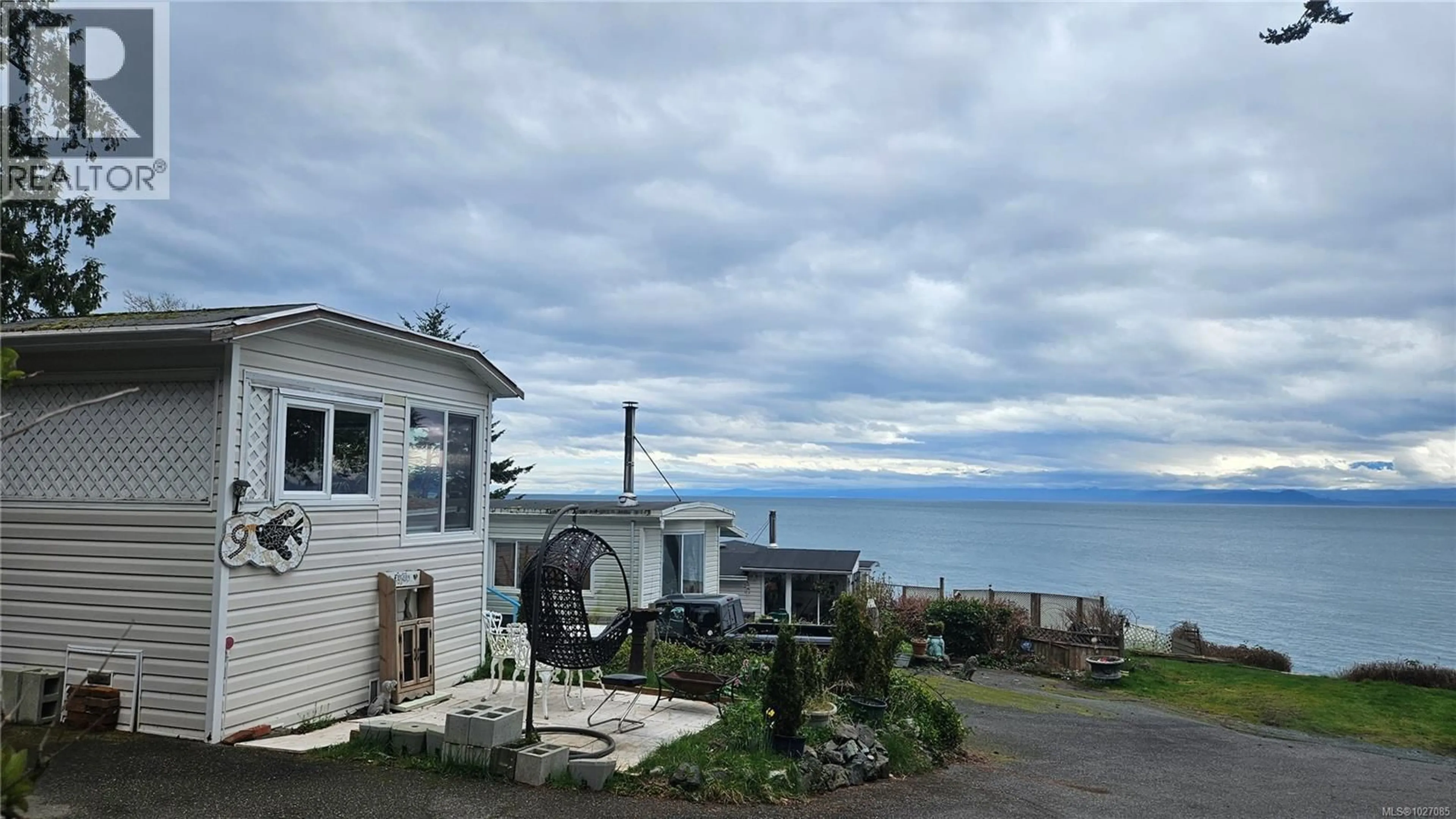 A pic from outside/outdoor area/front of a property/back of a property/a pic from drone, water/lake/river/ocean view for 9 - 8177 WEST COAST ROAD, Sooke British Columbia V9Z1E2