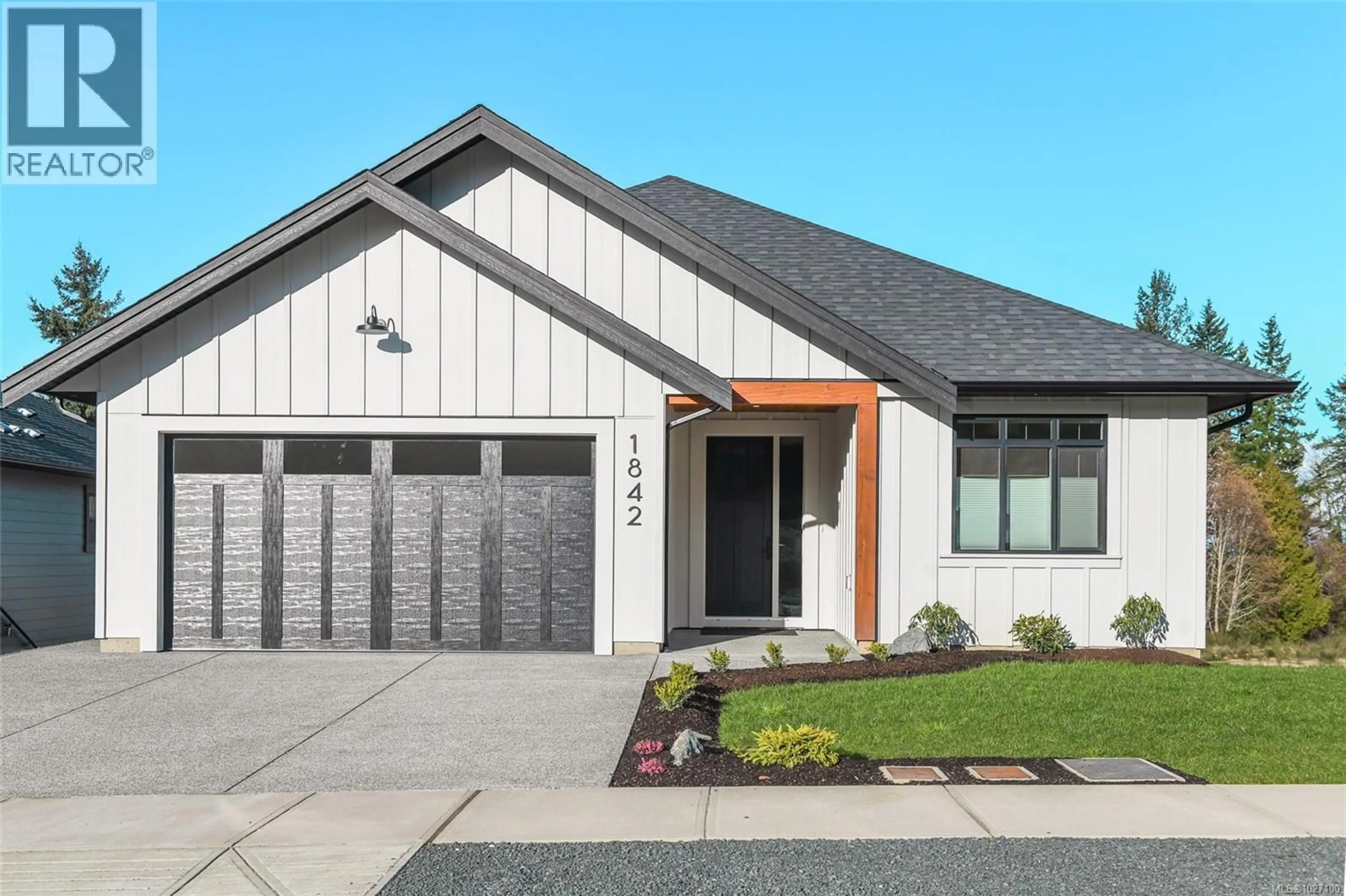 Home with vinyl exterior material, street for 1842 CROWN ISLE BOULEVARD, Courtenay British Columbia V9N9X5