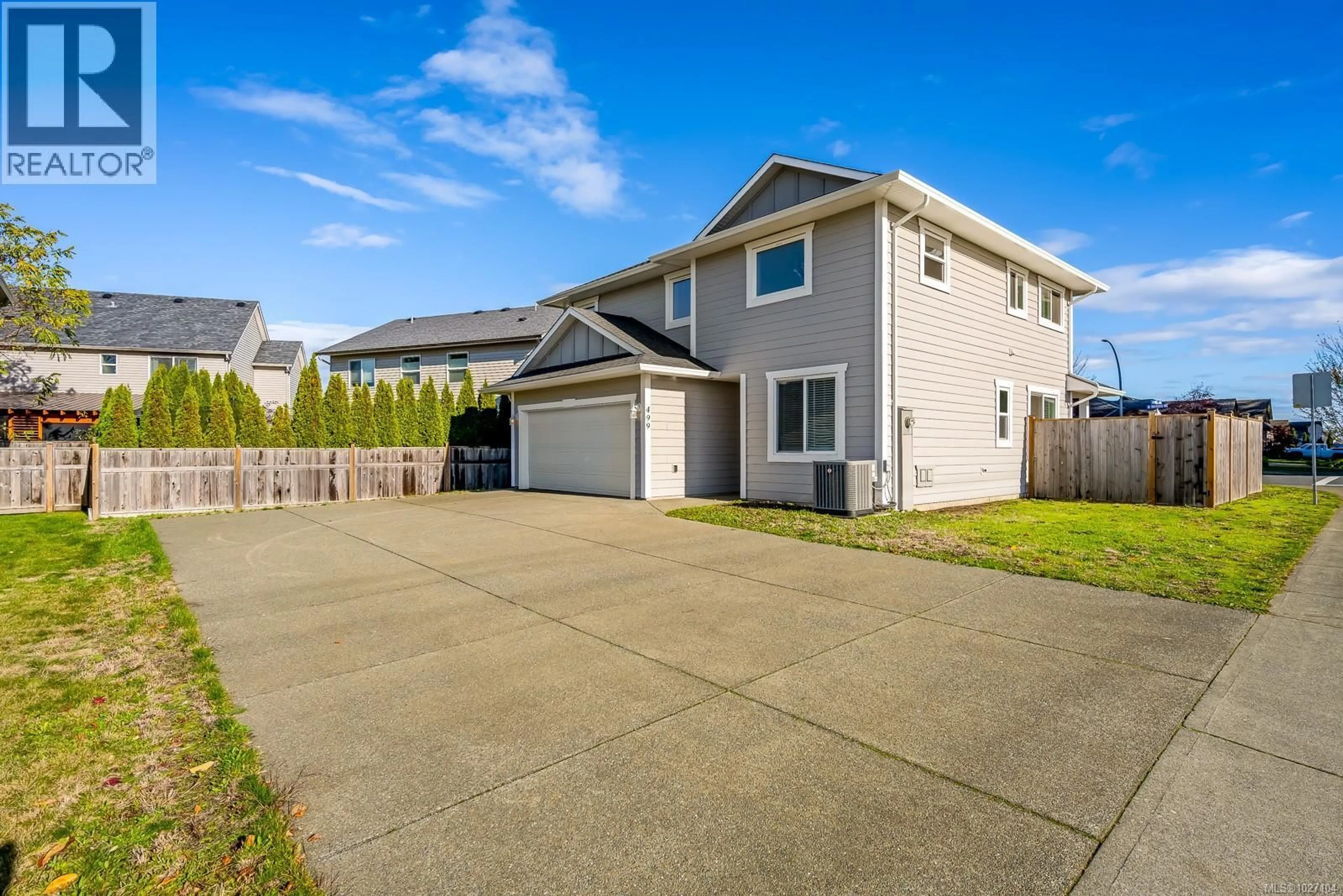 Home with vinyl exterior material, street for 499 TORRENCE ROAD, Comox British Columbia V9M3G7