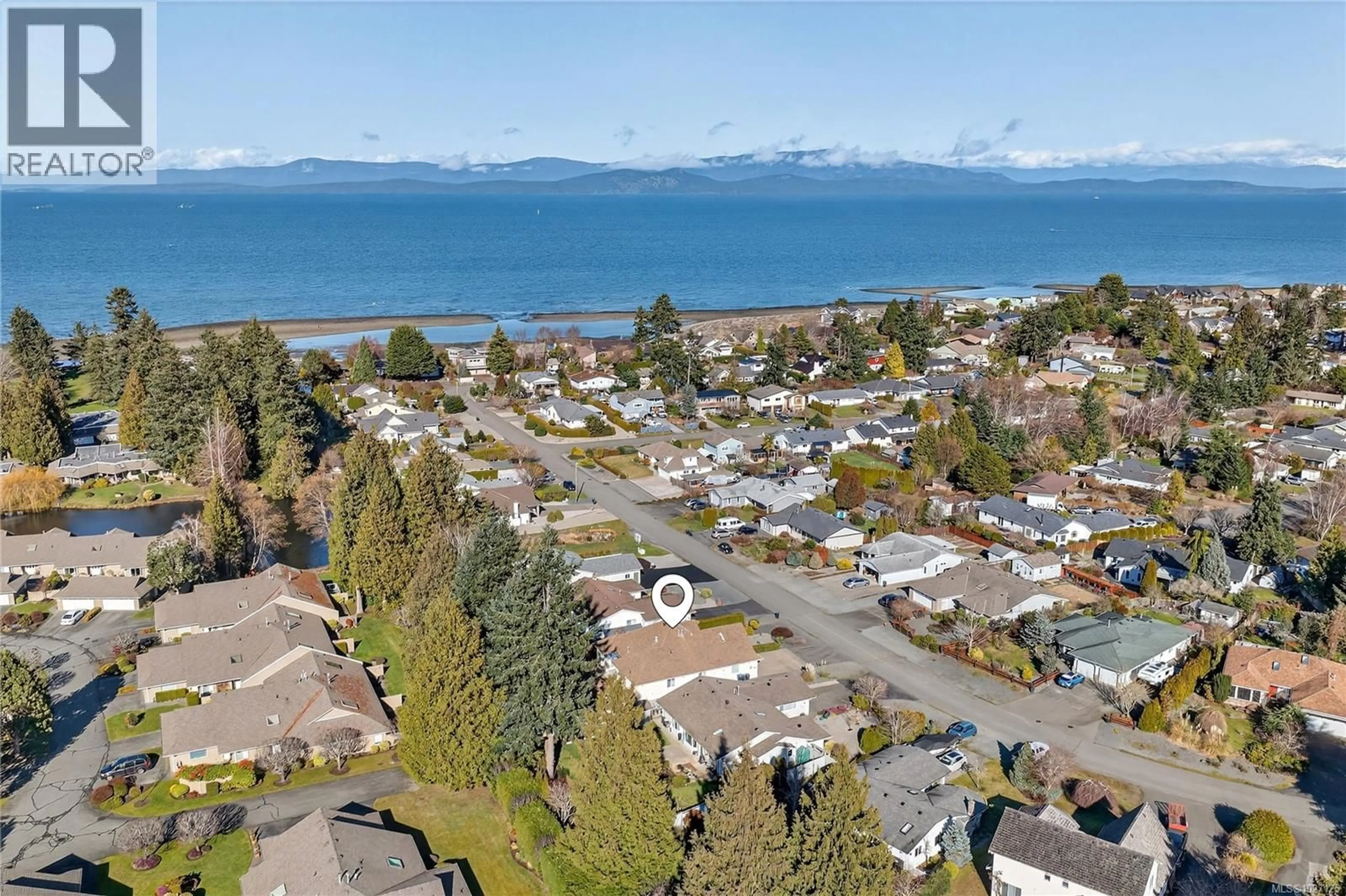 A pic from outside/outdoor area/front of a property/back of a property/a pic from drone, water/lake/river/ocean view for 552 DALMATIAN DRIVE, French Creek British Columbia V9P1Y4