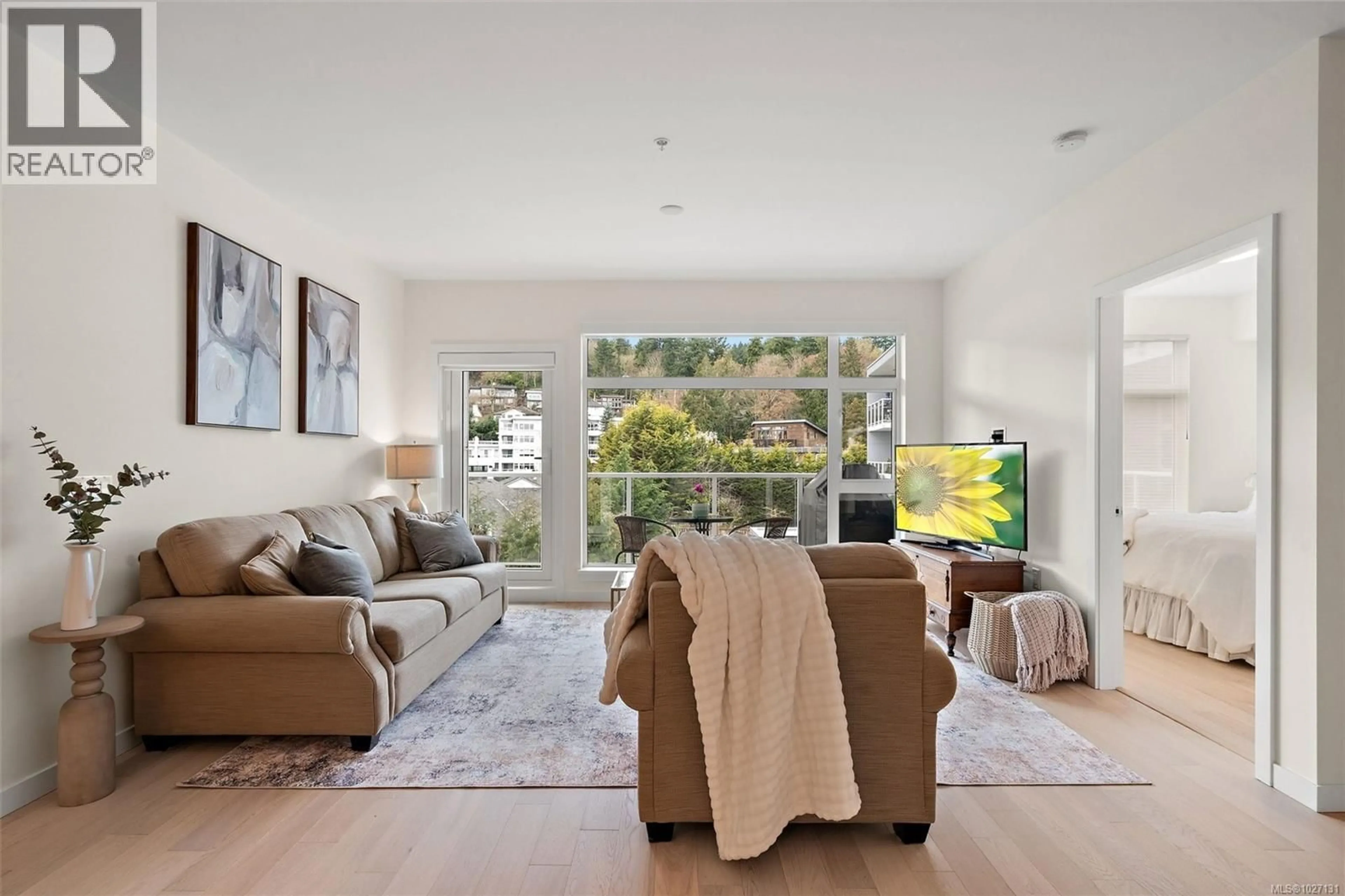 Living room with furniture, unknown for 309 - 5120 CORDOVA BAY ROAD, Saanich British Columbia V8Y2K5