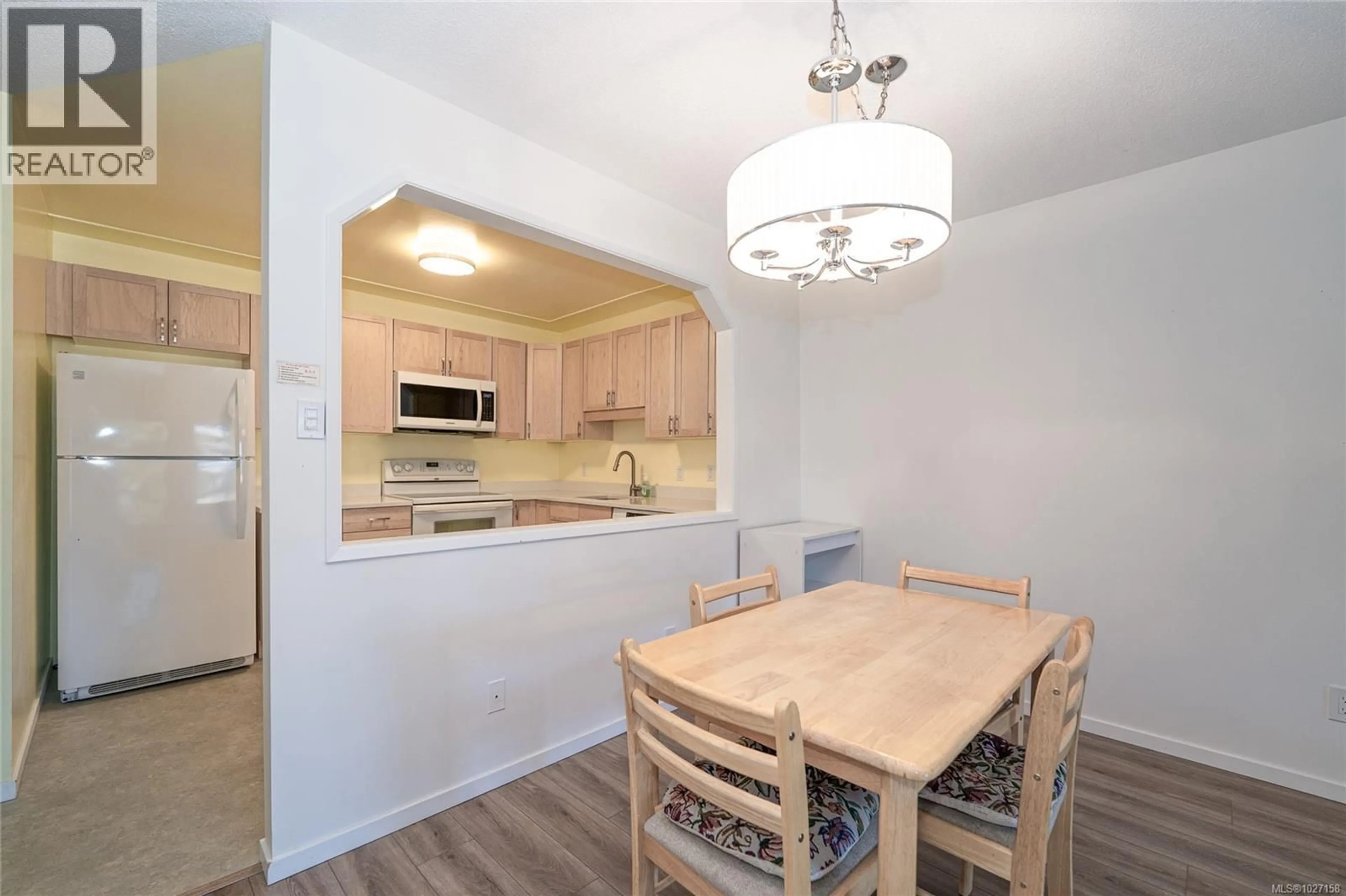 Standard kitchen, wood/laminate floor for 401 - 1188 YATES STREET, Victoria British Columbia V8V3M8