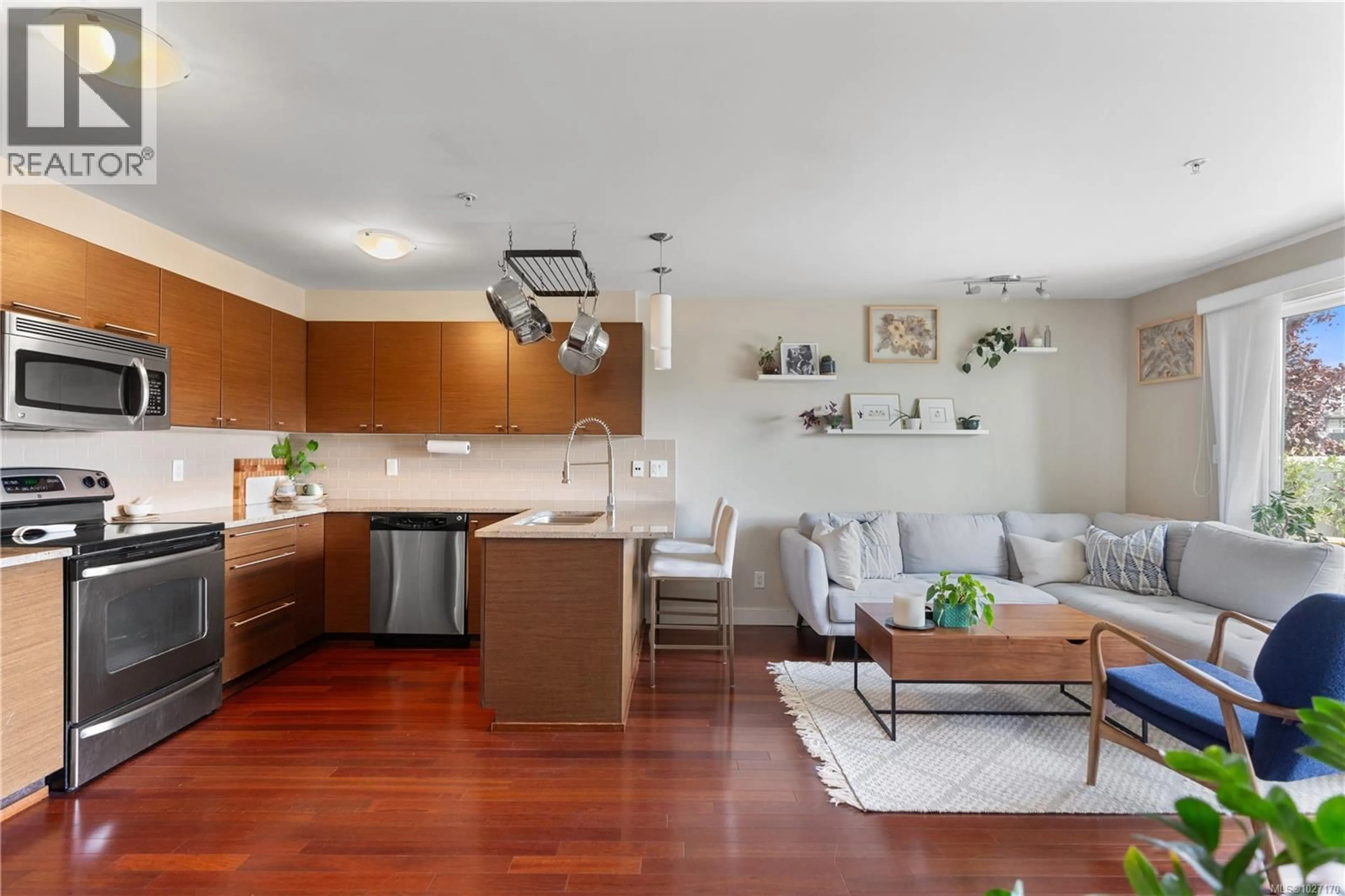 Open concept kitchen, wood/laminate floor for 217 - 1315 ESQUIMALT ROAD, Esquimalt British Columbia V9A3P5