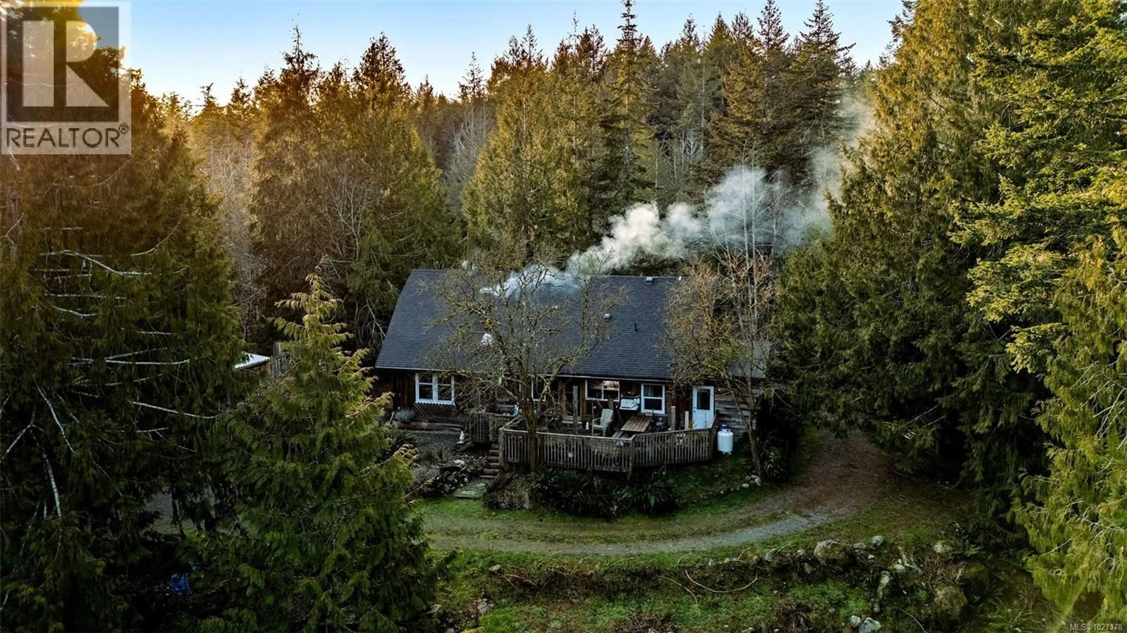 A pic from outside/outdoor area/front of a property/back of a property/a pic from drone, forest/trees view for 2993 ROBINSON ROAD, Sooke British Columbia V9Z0J9