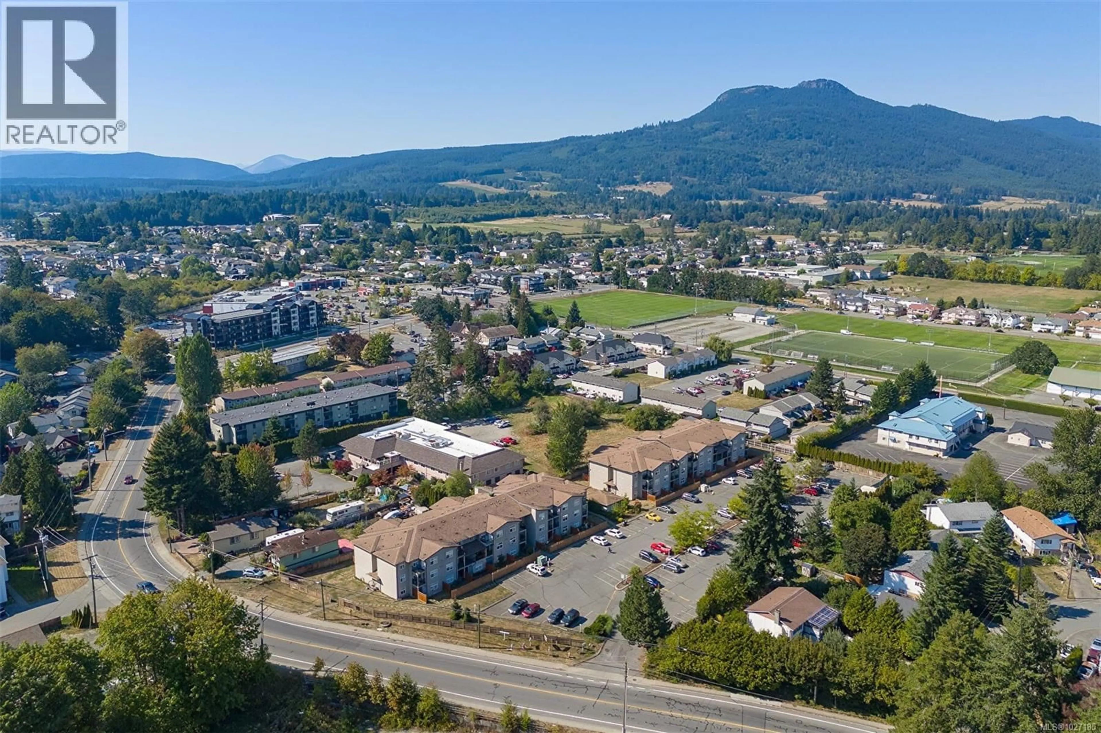 A pic from outside/outdoor area/front of a property/back of a property/a pic from drone, mountain view for 101 - 3215 COWICHAN LAKE ROAD, Duncan British Columbia V9L5G5