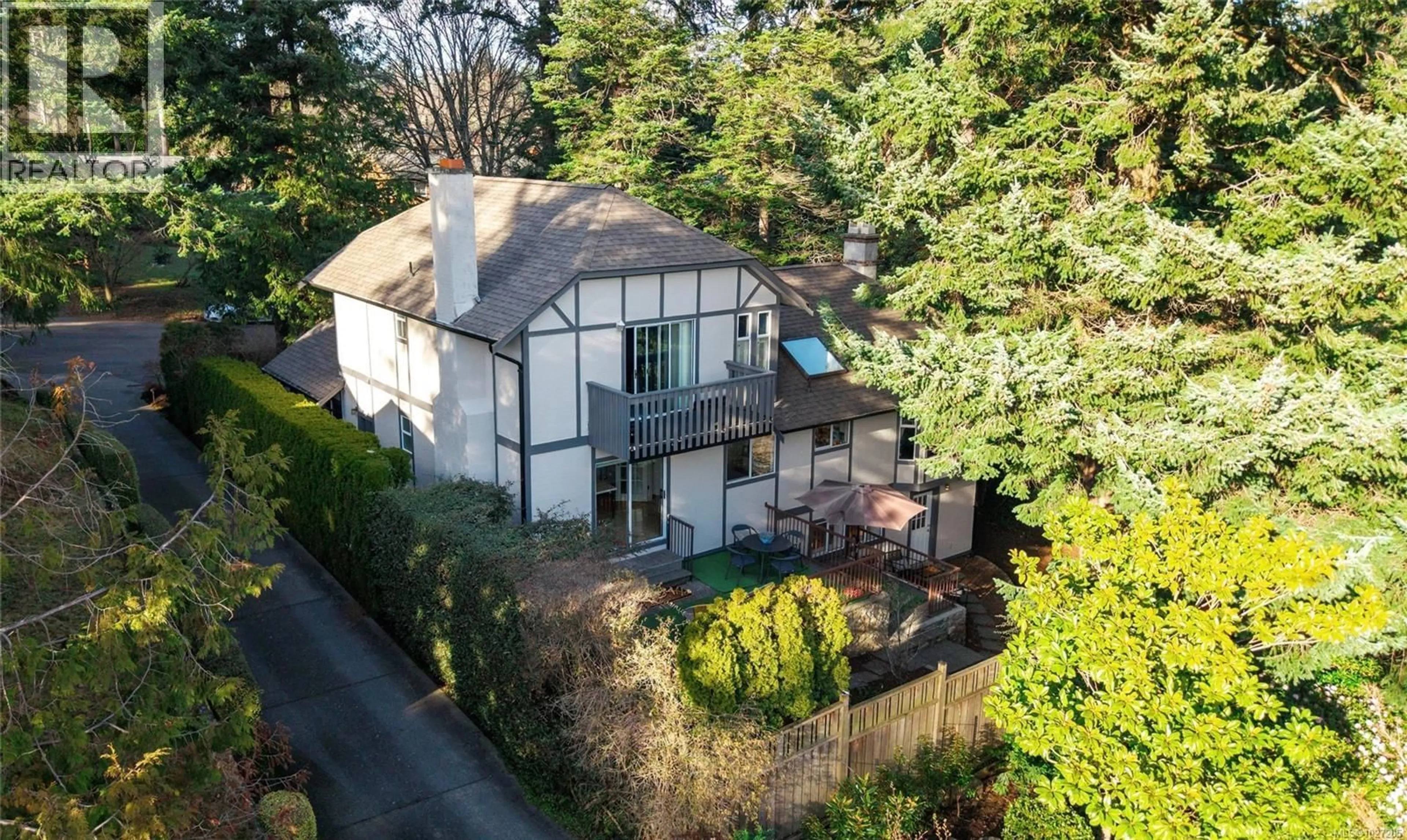 A pic from outside/outdoor area/front of a property/back of a property/a pic from drone, unknown for 3855 HARO ROAD, Saanich British Columbia V8N4A6