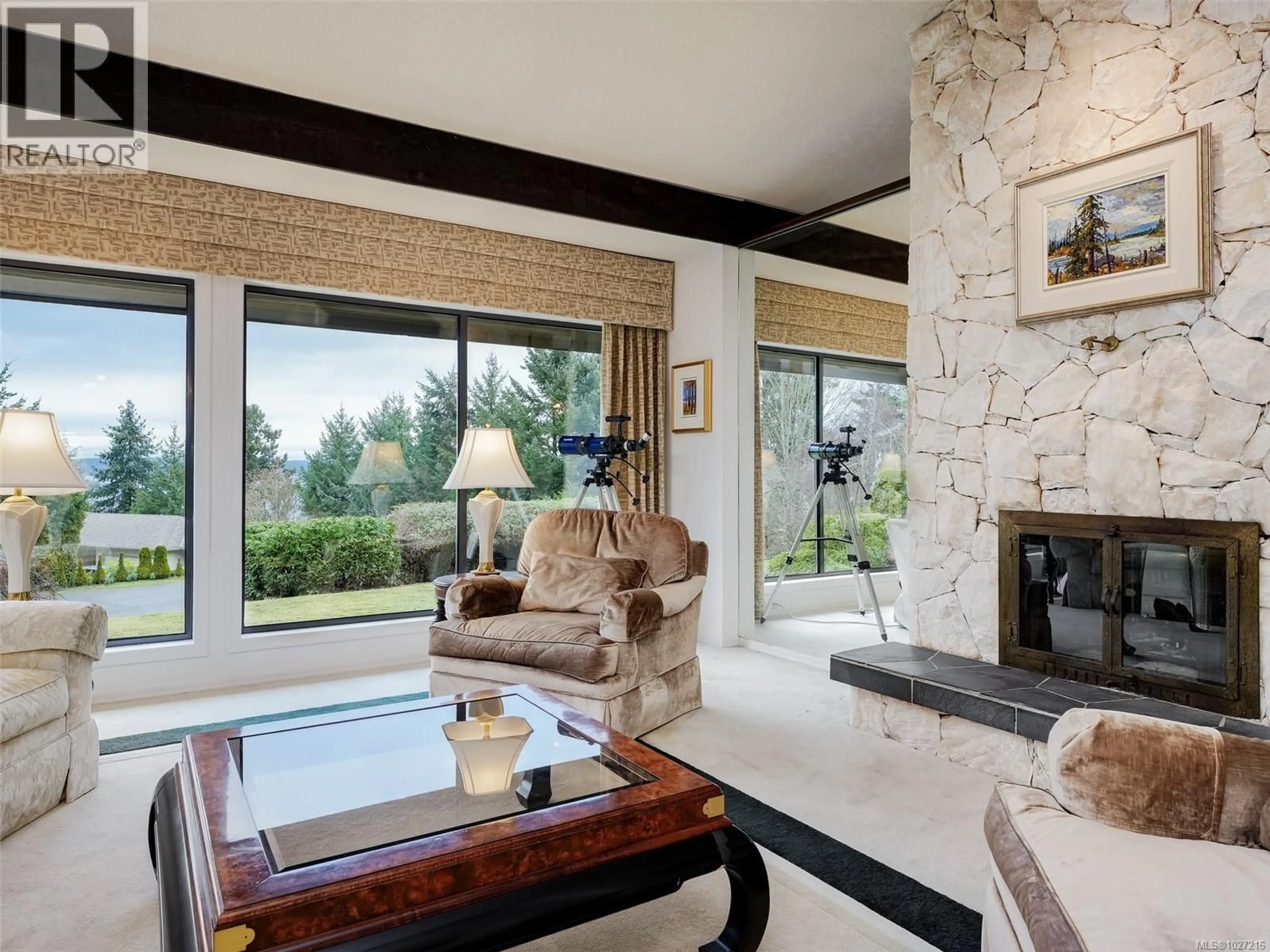 Living room with furniture, ceramic/tile floor for 11340 PACHENA PLACE, North Saanich British Columbia V8L5J5