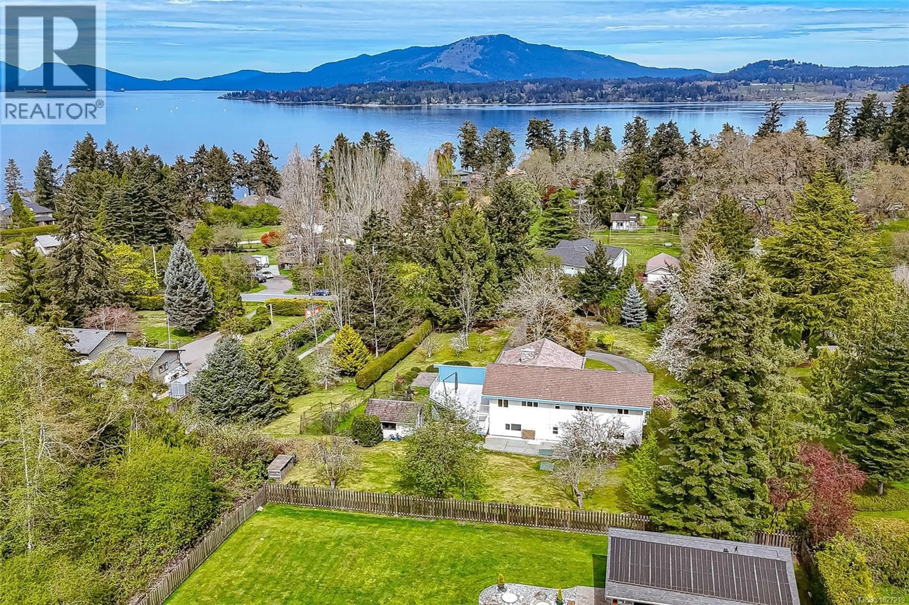 A pic from outside/outdoor area/front of a property/back of a property/a pic from drone, water/lake/river/ocean view for 9723 ARDMORE DRIVE, North Saanich British Columbia V8L5H5
