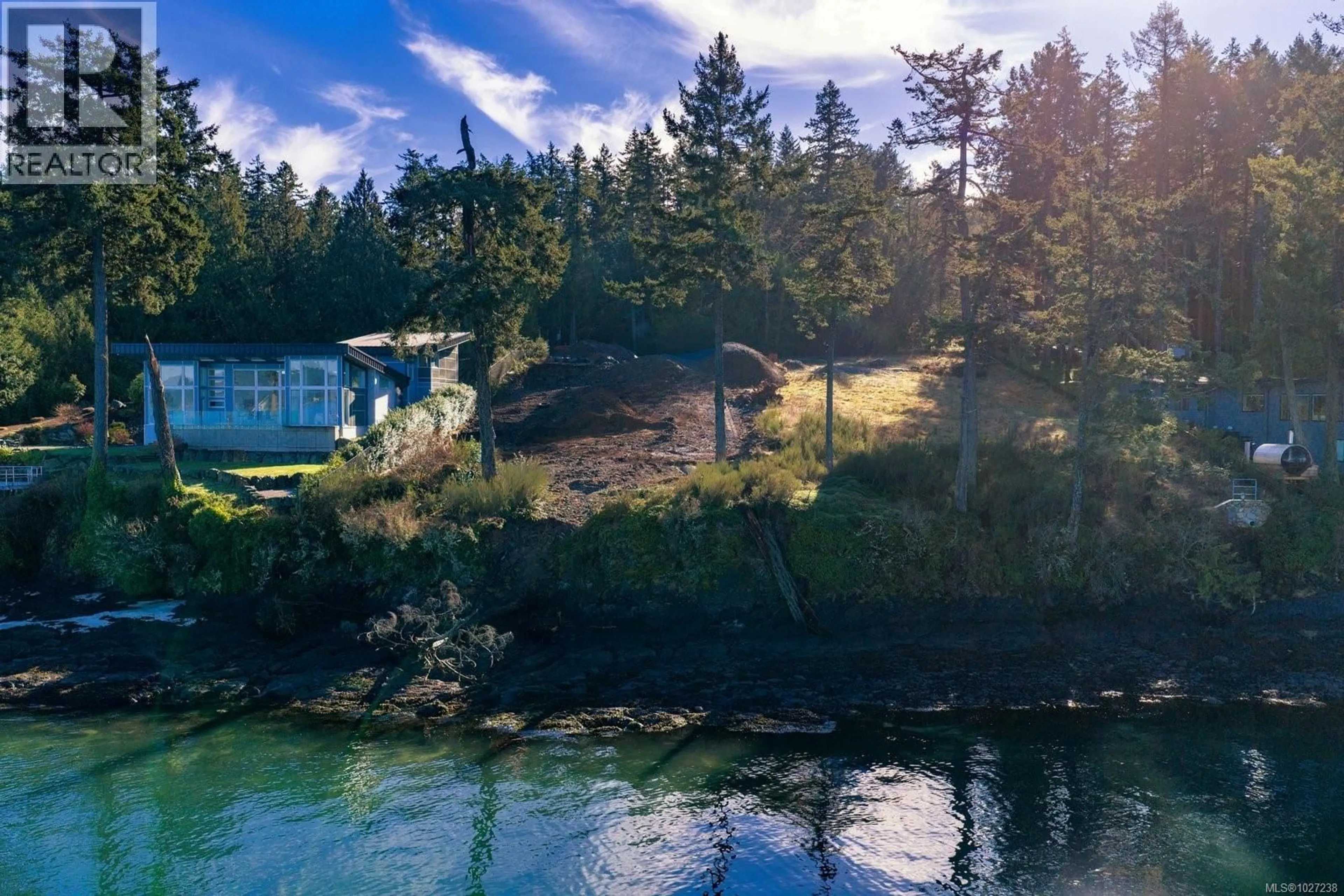 A pic from outside/outdoor area/front of a property/back of a property/a pic from drone, water/lake/river/ocean view for 770 LANDS END ROAD, North Saanich British Columbia V8L5K9