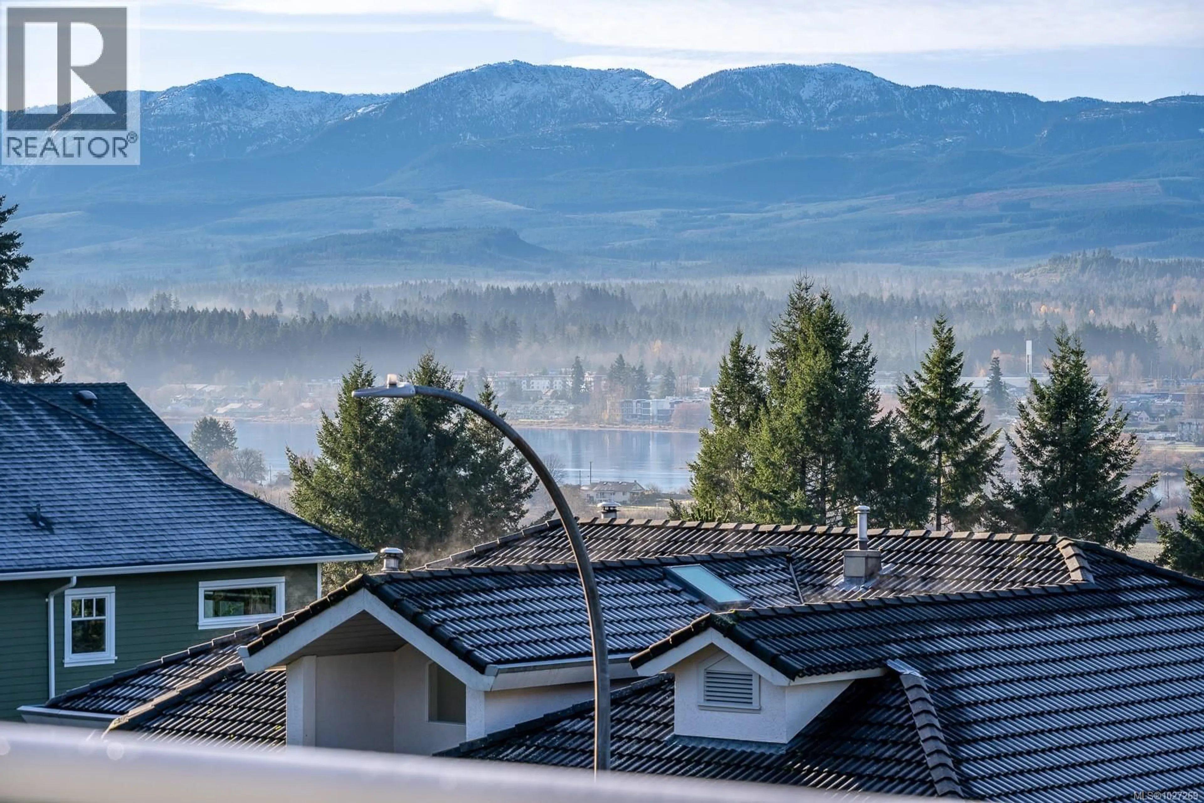 A pic from outside/outdoor area/front of a property/back of a property/a pic from drone, mountain view for 1418 VALLEY VIEW DRIVE, Courtenay British Columbia V9N8T3