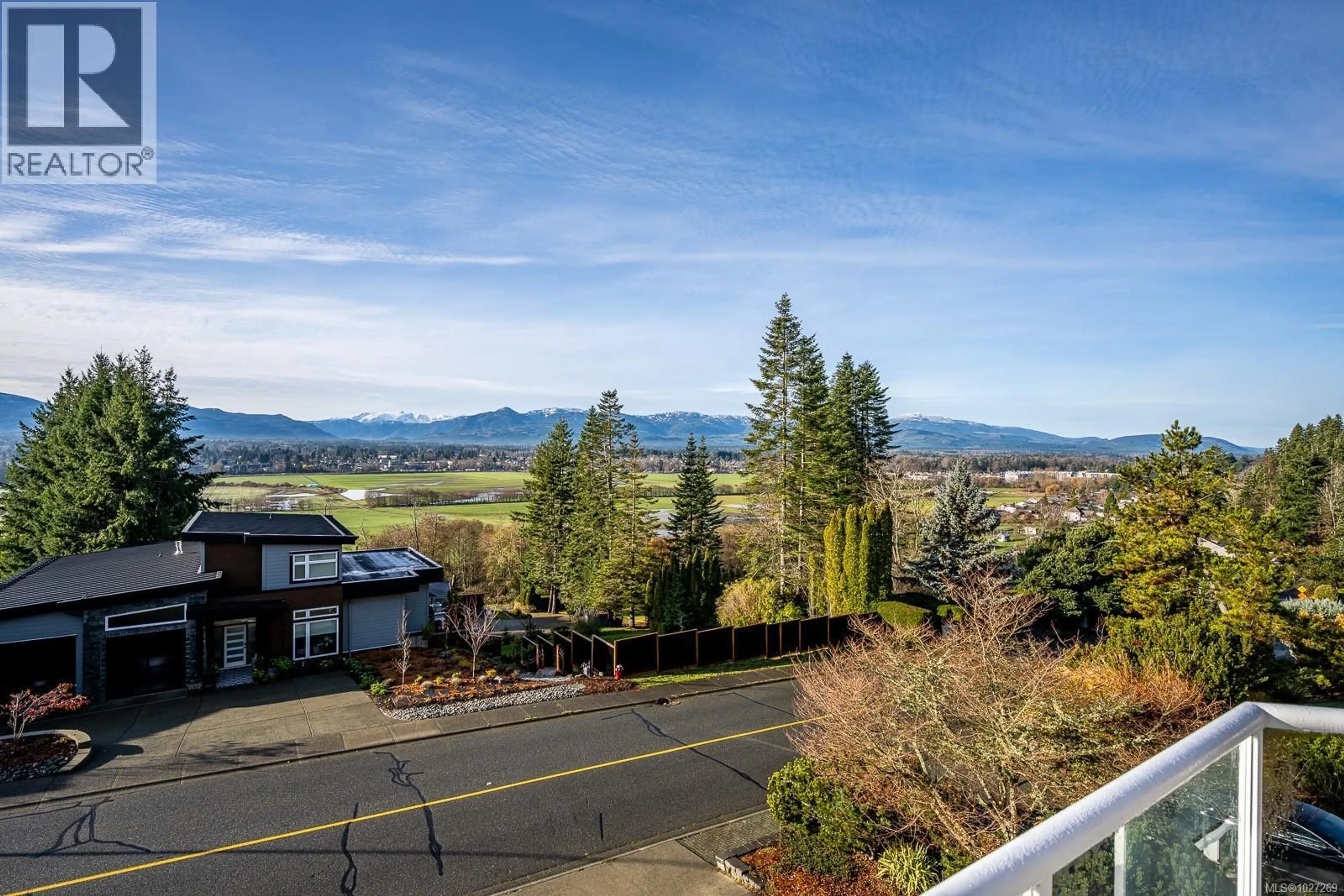 A pic from outside/outdoor area/front of a property/back of a property/a pic from drone, mountain view for 1418 VALLEY VIEW DRIVE, Courtenay British Columbia V9N8T3