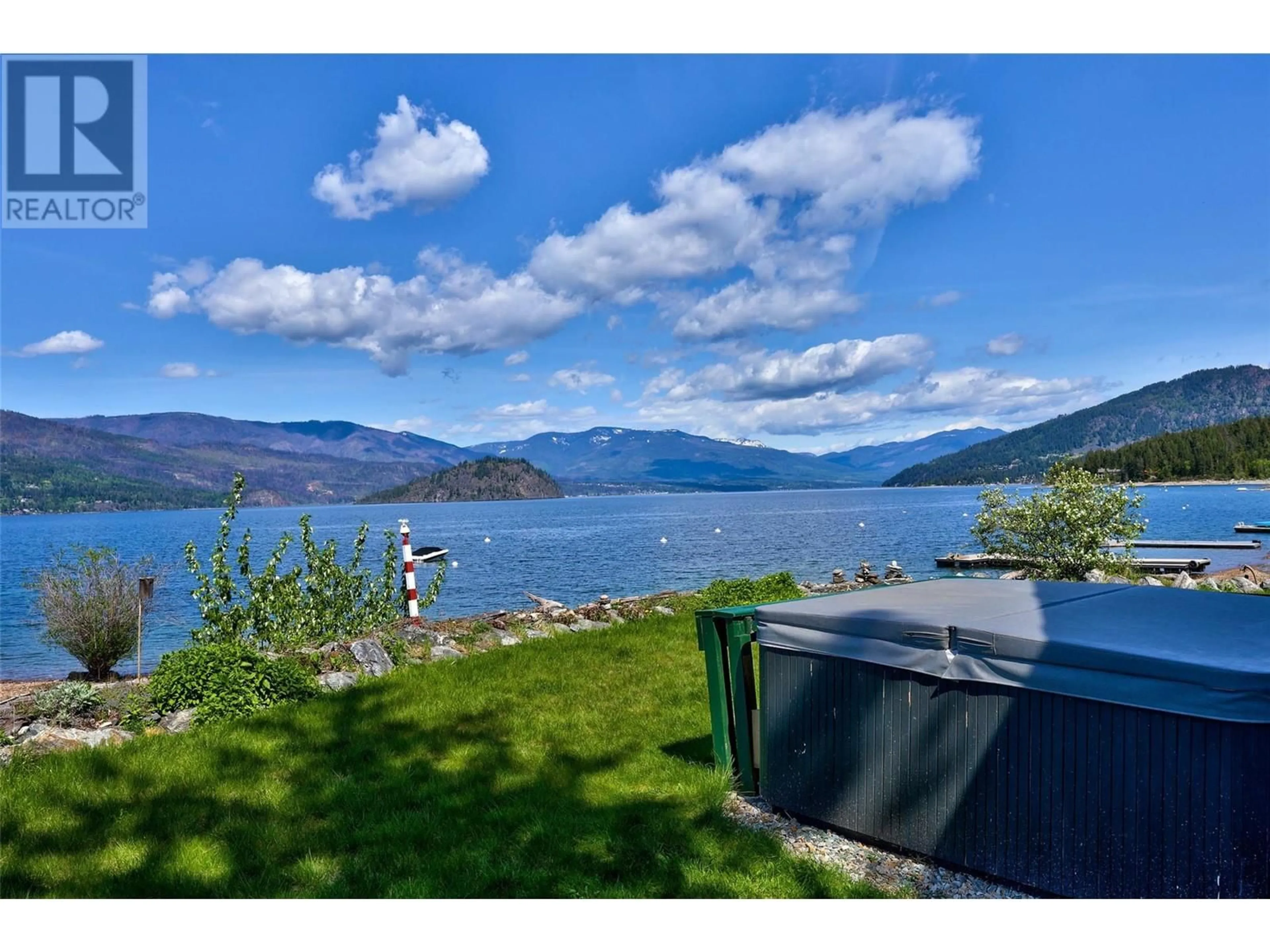 A pic from outside/outdoor area/front of a property/back of a property/a pic from drone, water/lake/river/ocean view for 115 - 1837 ARCHIBALD ROAD, Blind Bay British Columbia V0E2W1