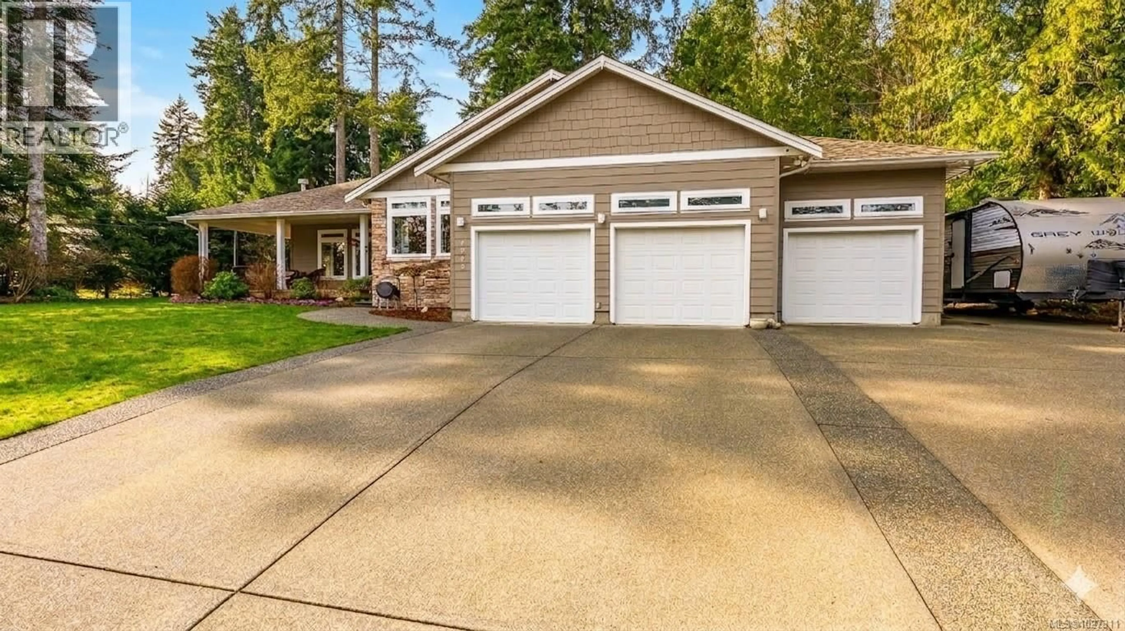 Home with vinyl exterior material, street for 6503 WALKER FRONTAGE ROAD, Fanny Bay British Columbia V0R1W0