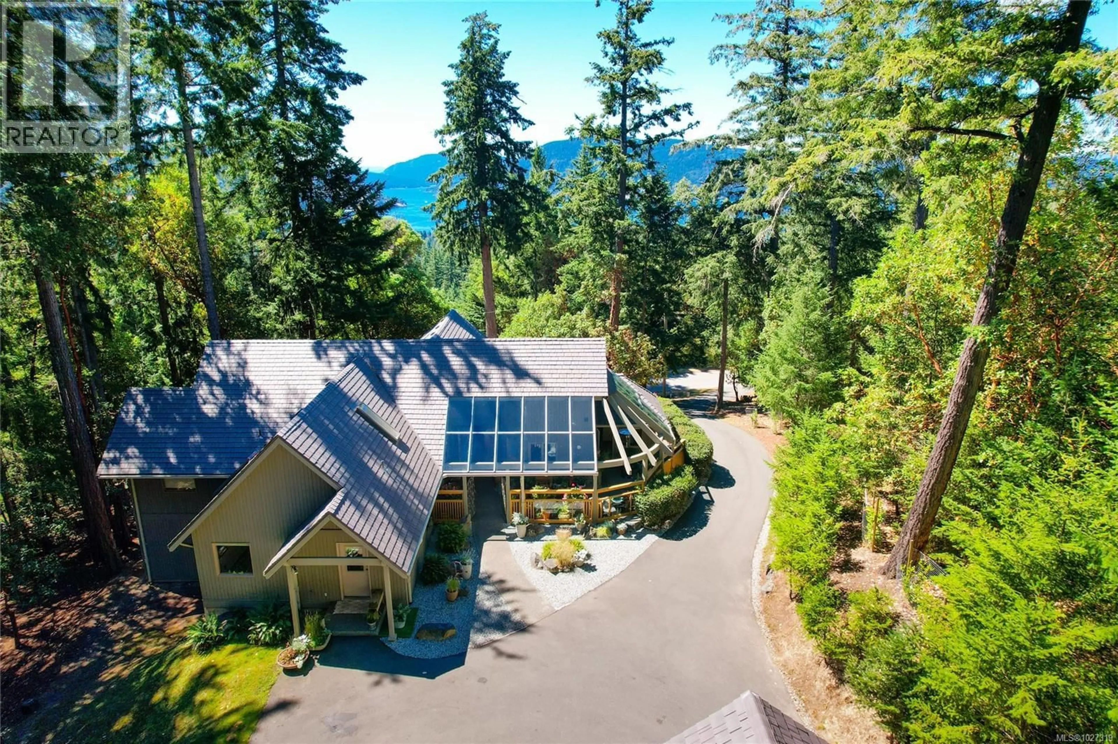 A pic from outside/outdoor area/front of a property/back of a property/a pic from drone, mountain view for 154 CORMORANT CRESCENT, Salt Spring British Columbia V8K1G8