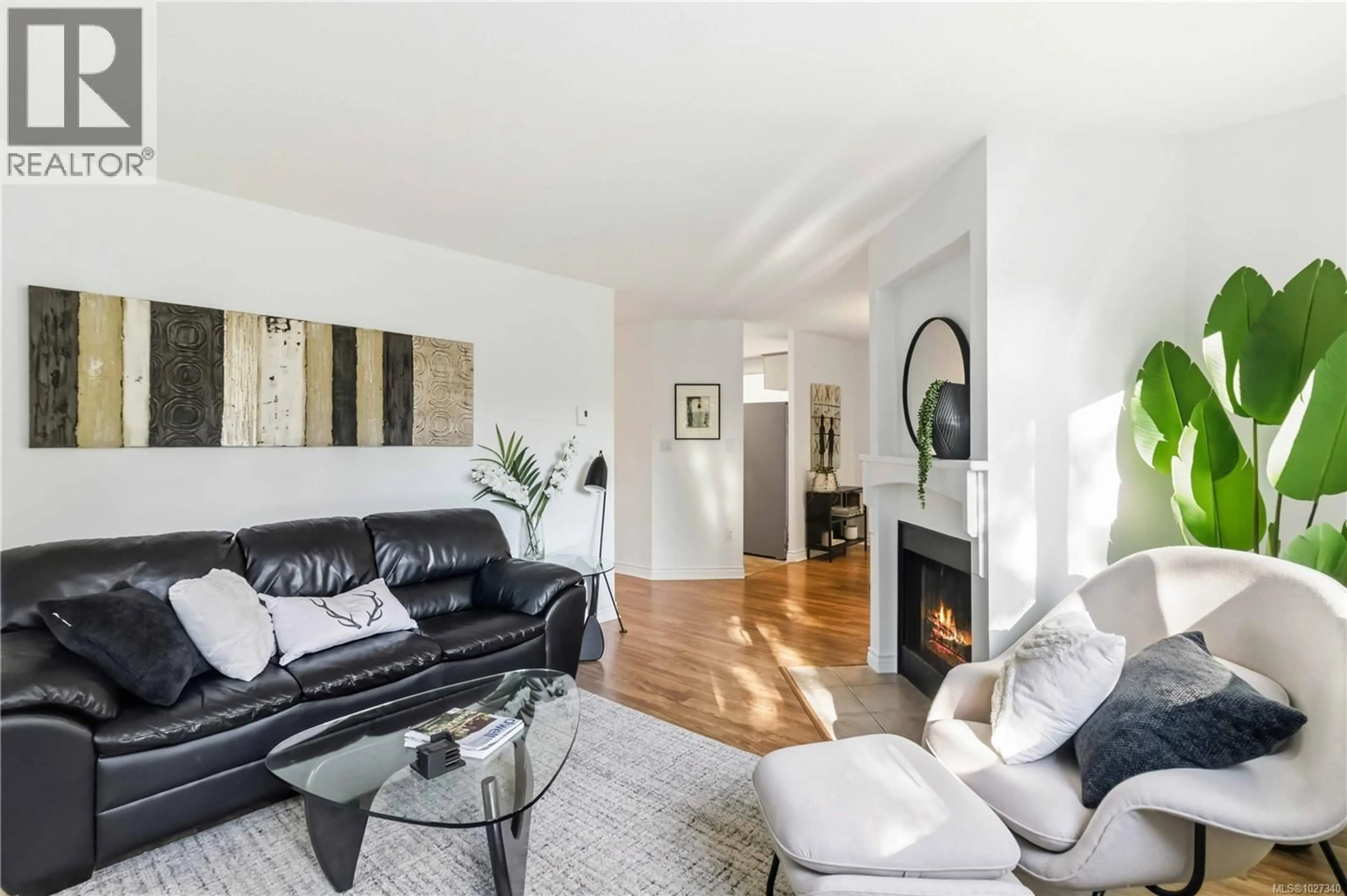 Living room with furniture, wood/laminate floor for 302 - 1436 HARRISON STREET, Victoria British Columbia V8S3S2