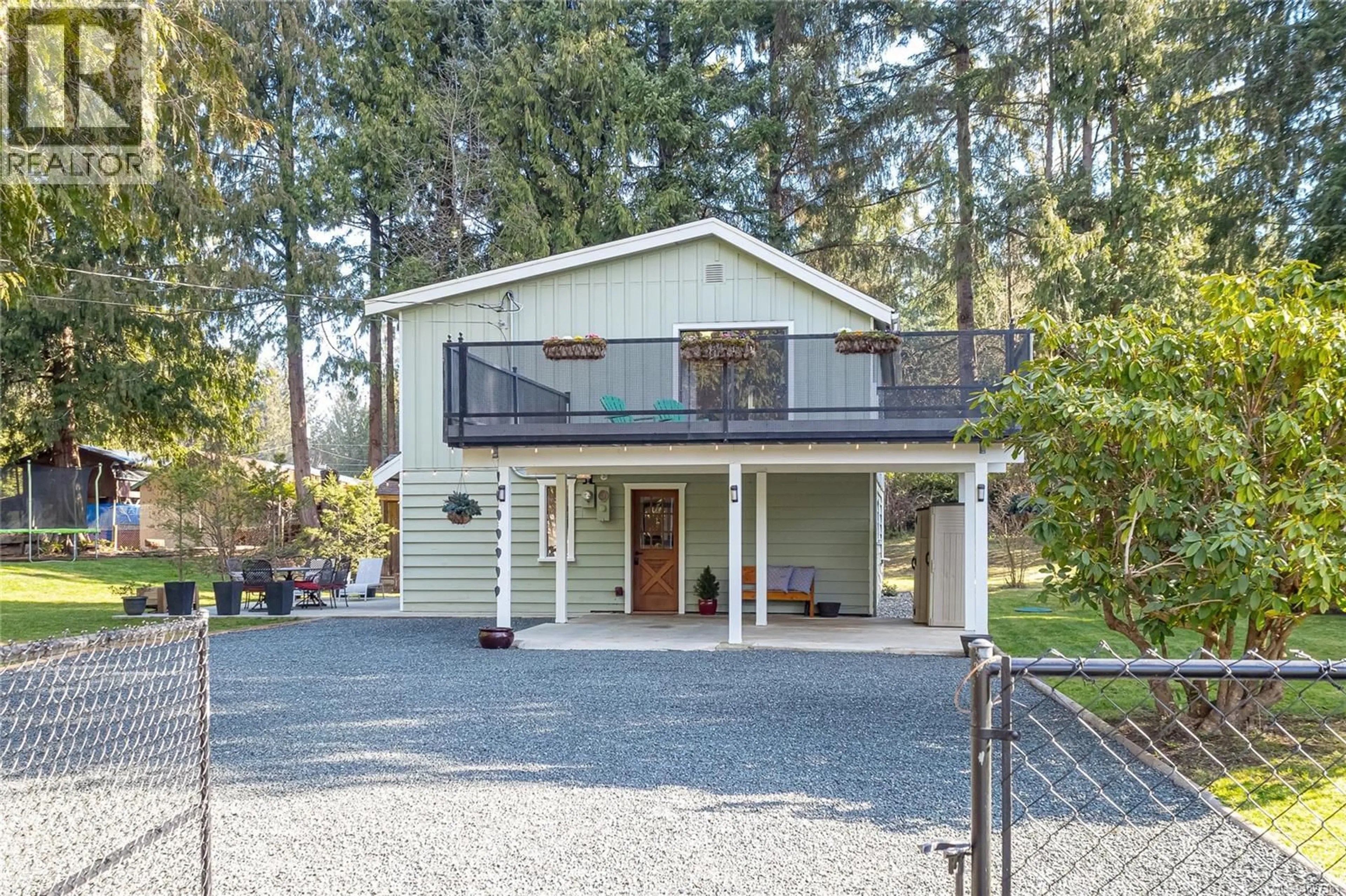 Home with vinyl exterior material, street for 864 CARSON ROAD, Whiskey Creek British Columbia V9K1V7