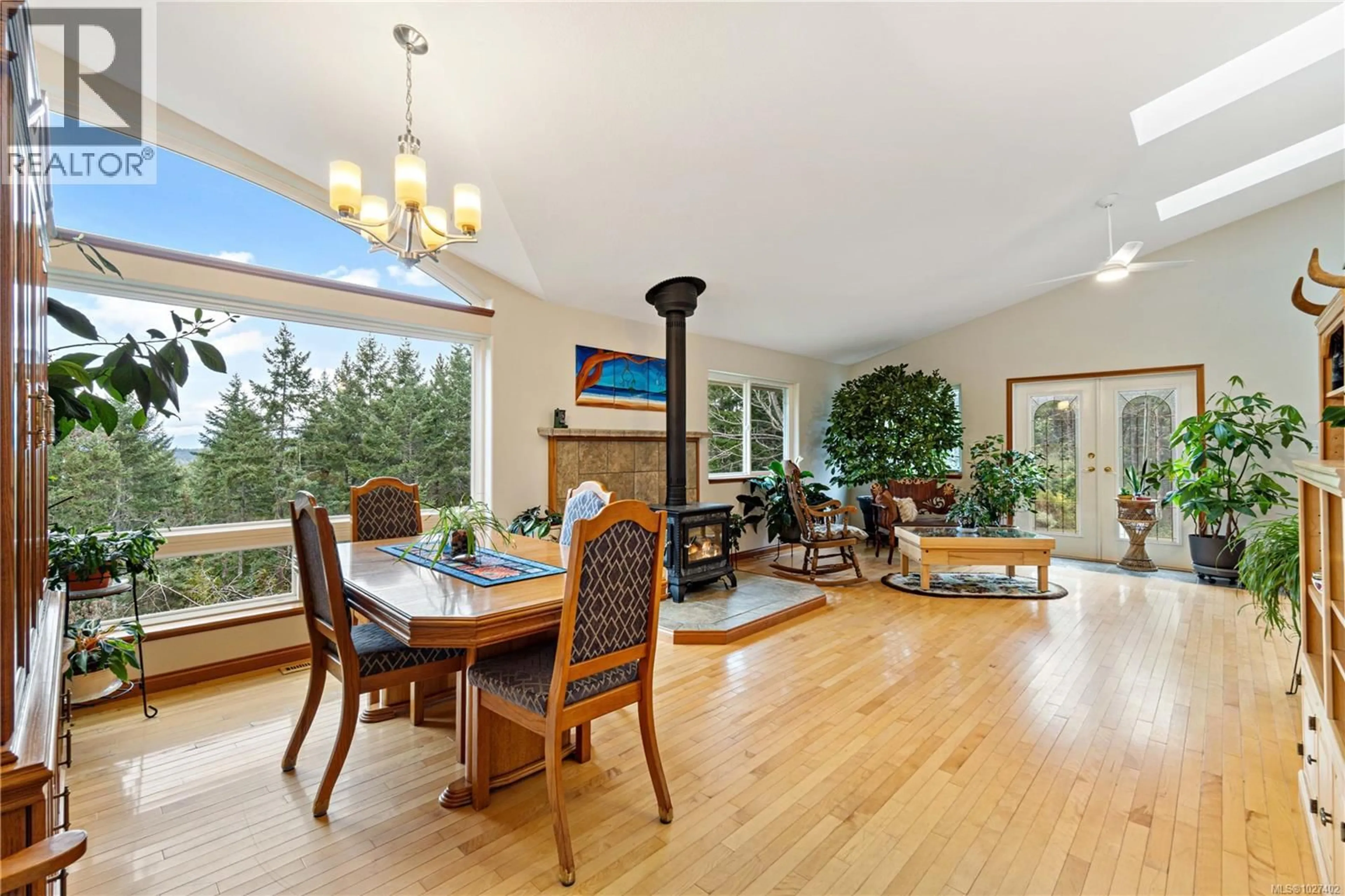 Dining room, wood/laminate floor for 1990 RENA ROAD, Nanoose Bay British Columbia V9P9B1