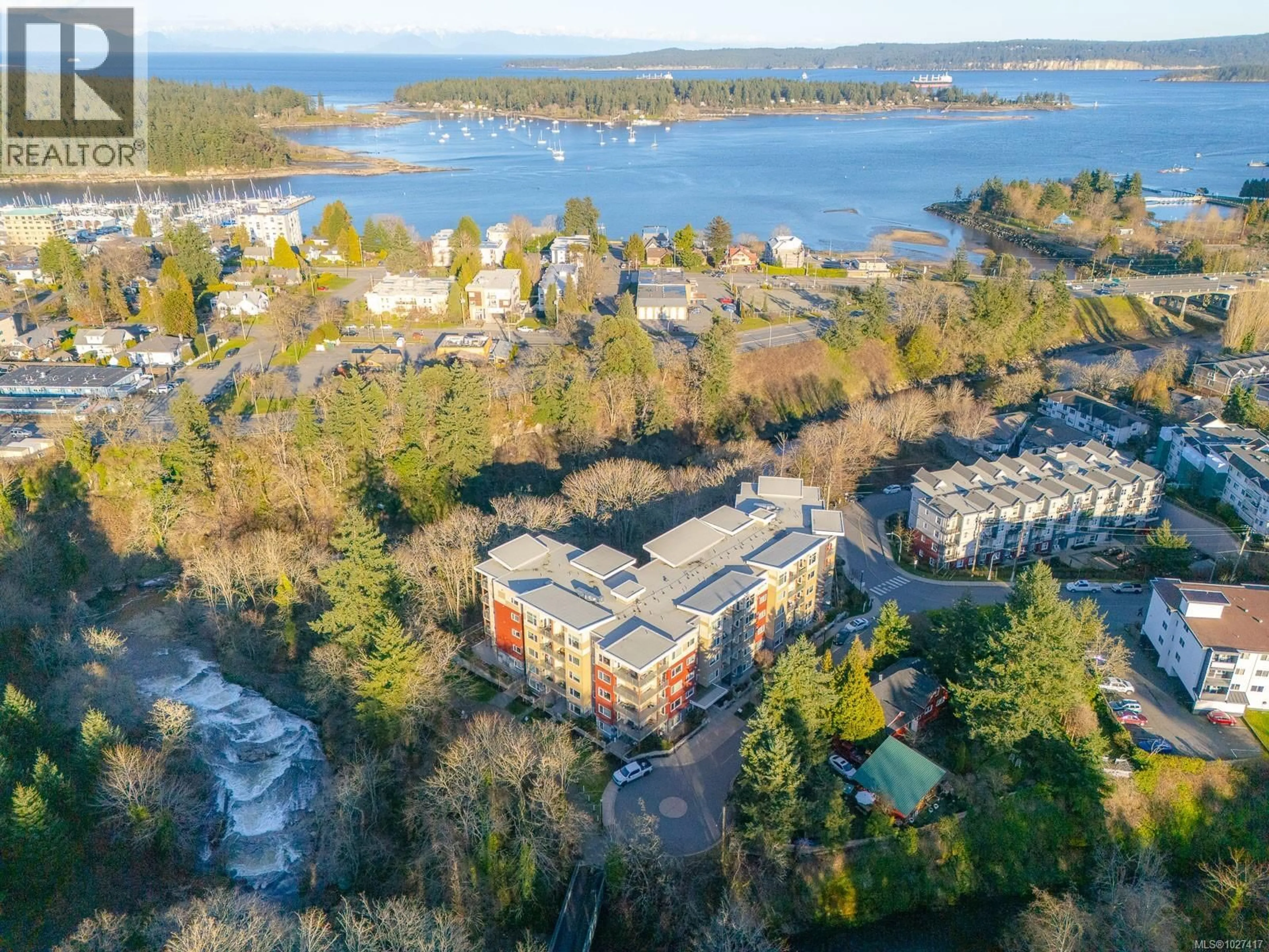 A pic from outside/outdoor area/front of a property/back of a property/a pic from drone, water/lake/river/ocean view for 117 - 20 BARSBY AVENUE, Nanaimo British Columbia V9C3Y6