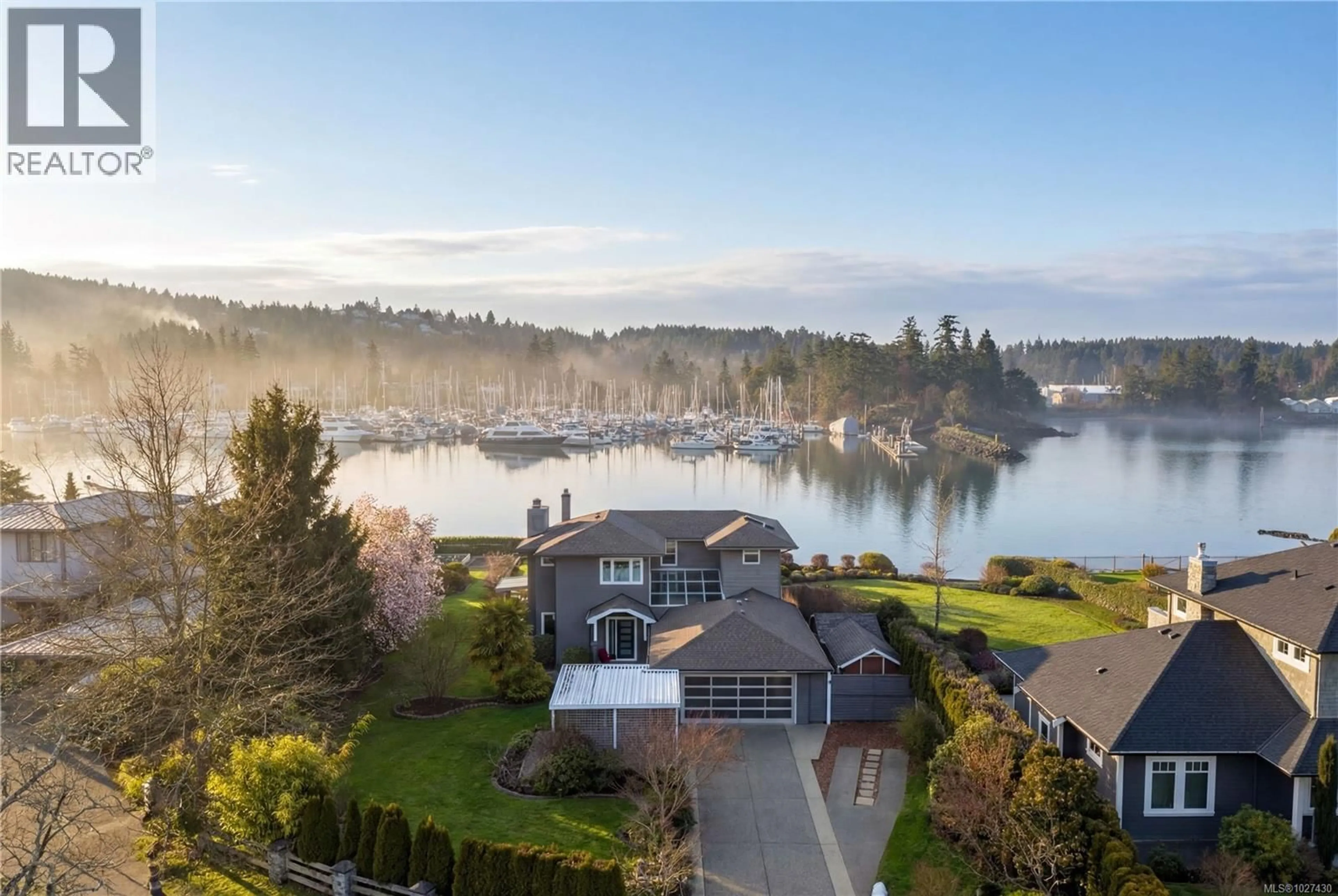 A pic from outside/outdoor area/front of a property/back of a property/a pic from drone, water/lake/river/ocean view for 10680 BLUE HERON ROAD, North Saanich British Columbia V8L5S6