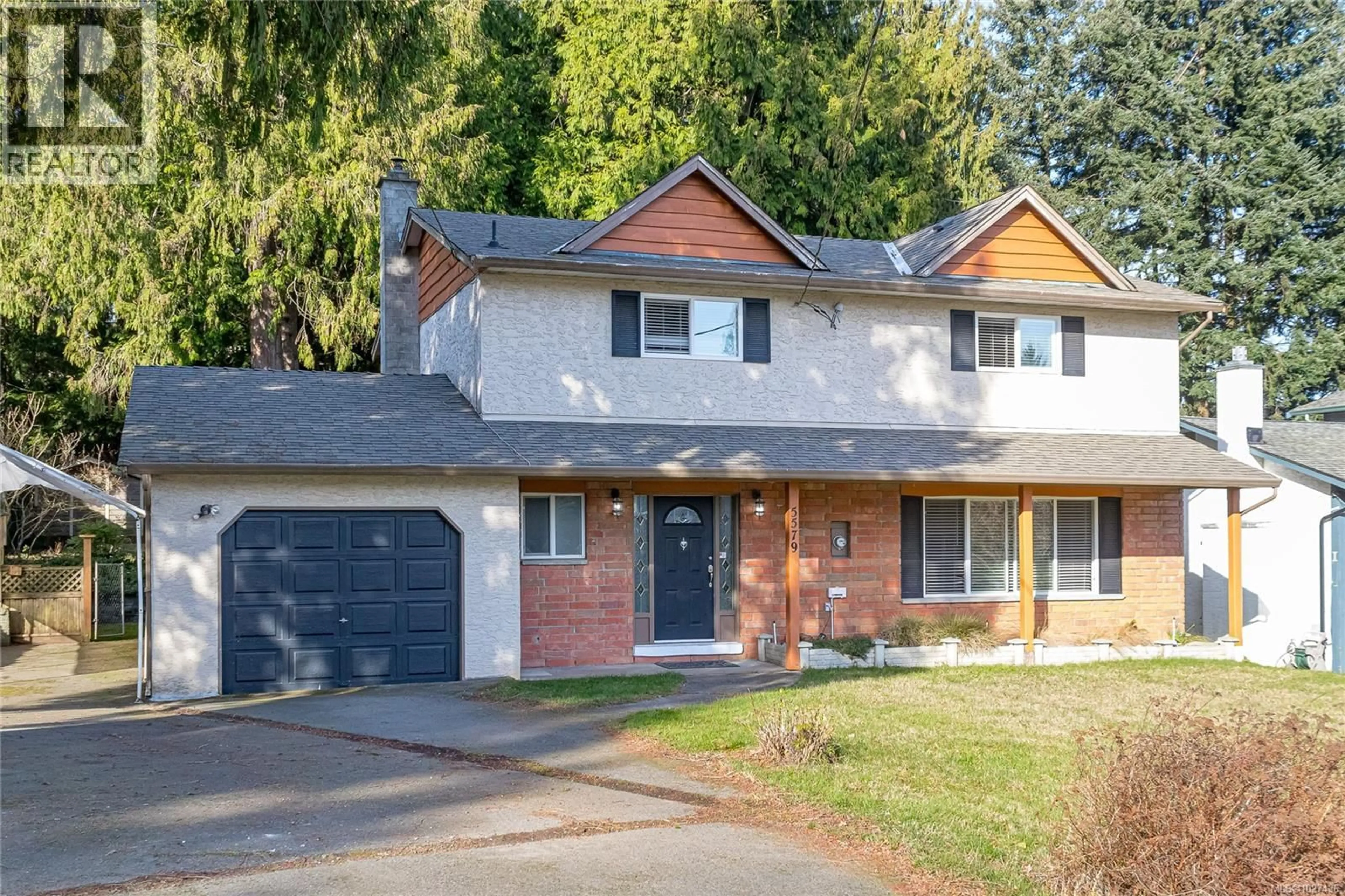 Home with brick exterior material, street for 5579 KENWILL DRIVE, Nanaimo British Columbia V9T5M5