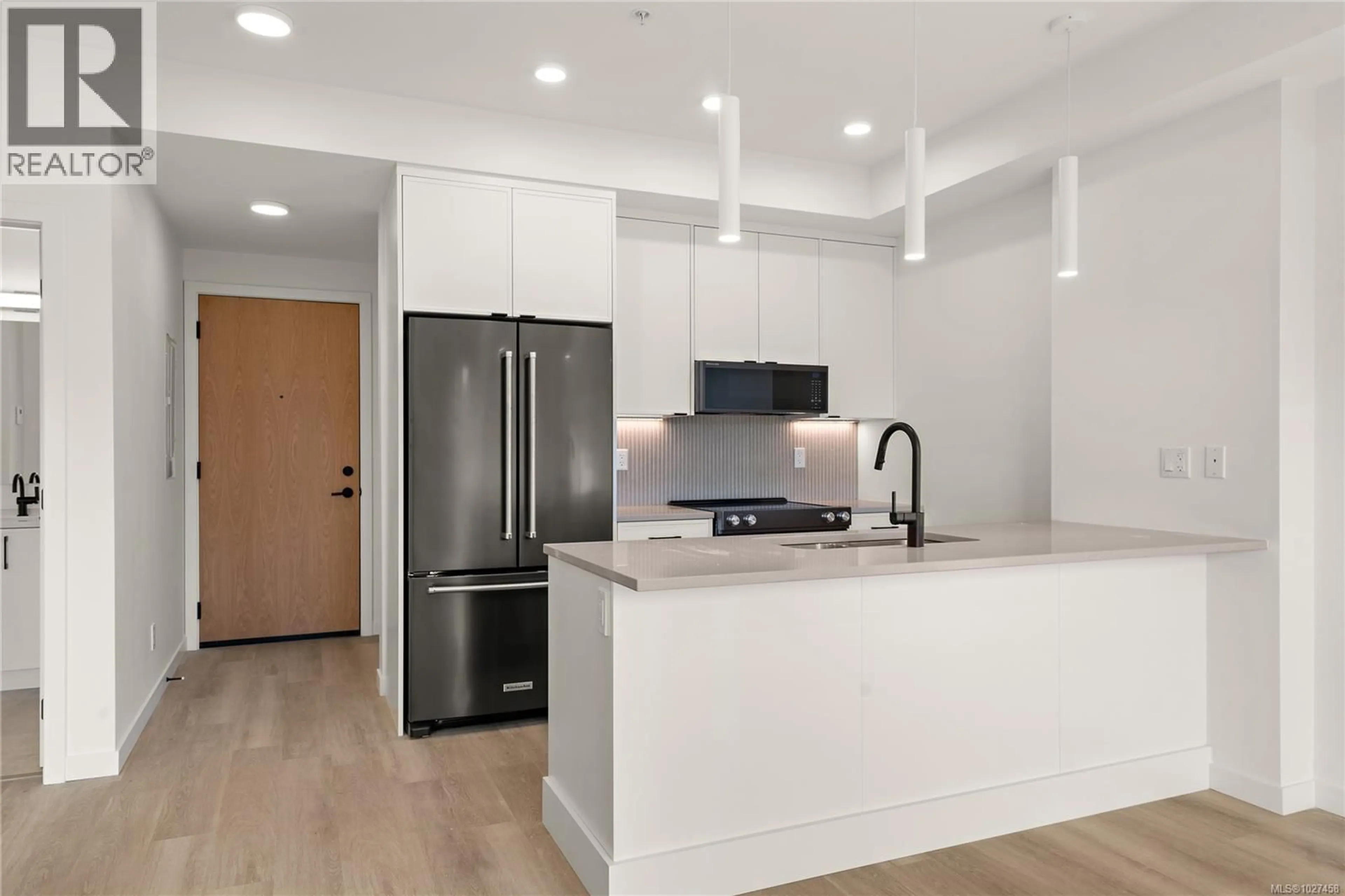 Open concept kitchen, unknown for 409 - 1102 ESQUIMALT ROAD, Esquimalt British Columbia V9A0L3