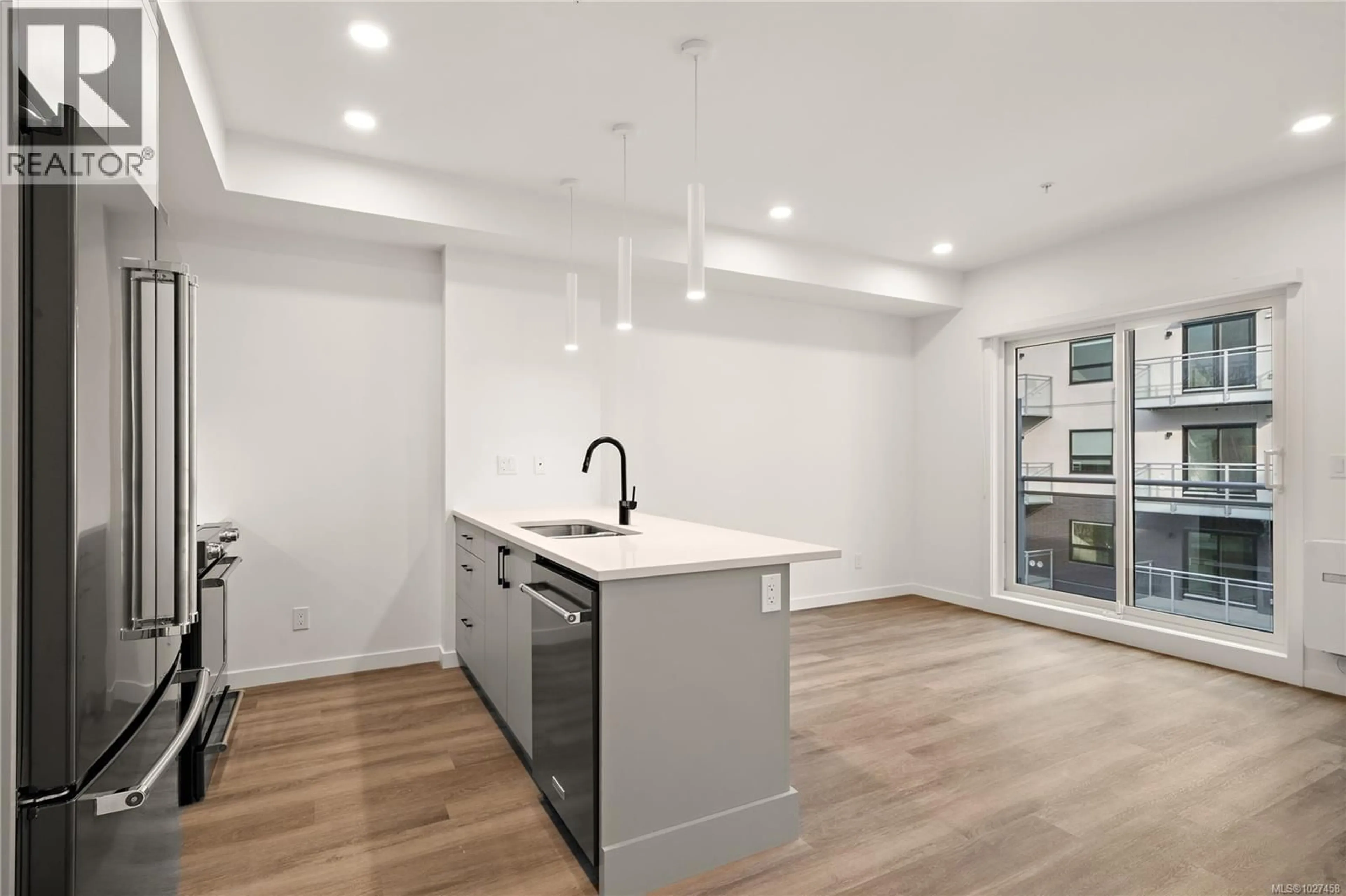 Open concept kitchen, unknown for 409 - 1102 ESQUIMALT ROAD, Esquimalt British Columbia V9A0L3