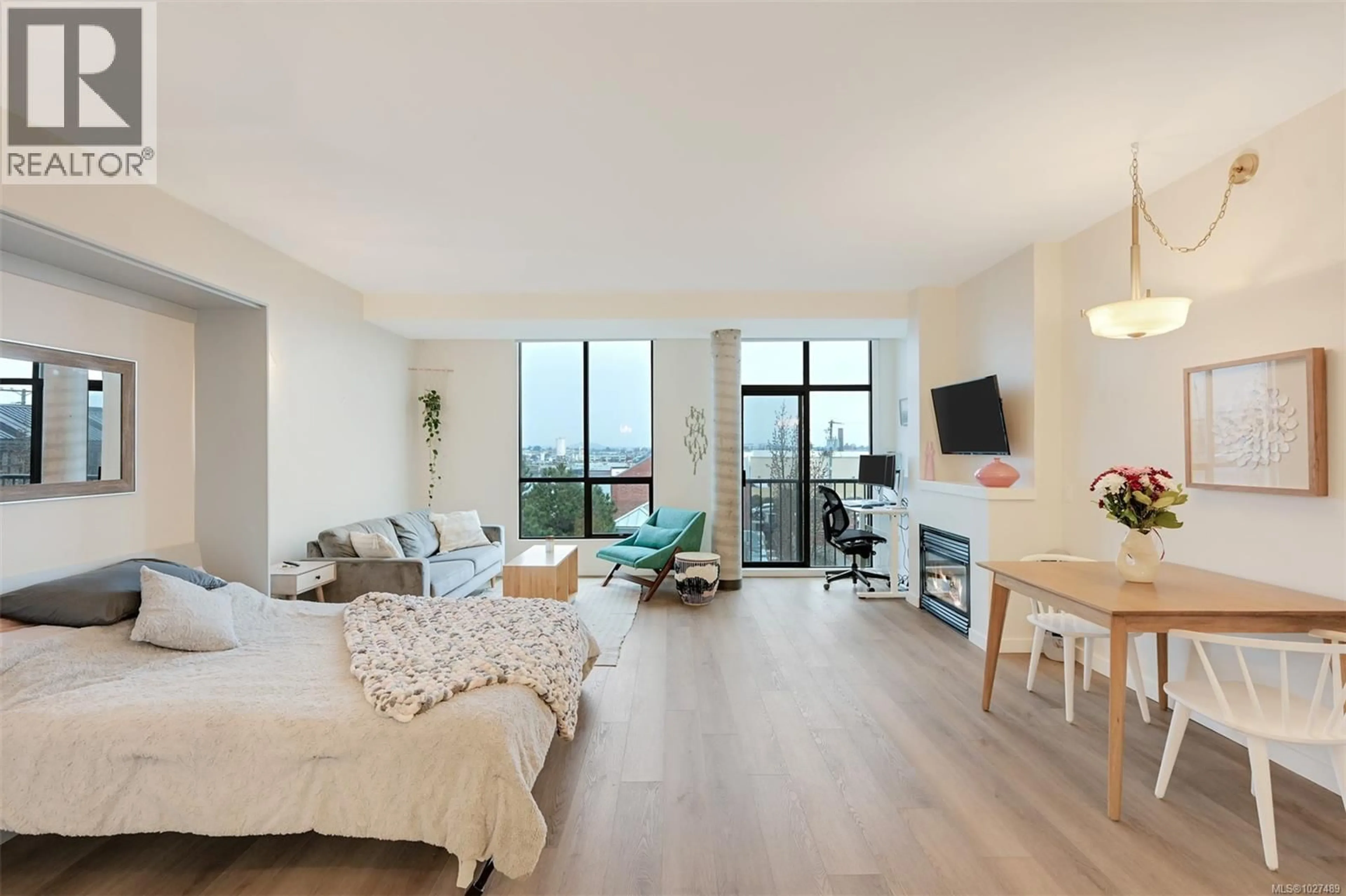 Living room with furniture, wood/laminate floor for 413 - 409 SWIFT STREET, Victoria British Columbia V8W1S2