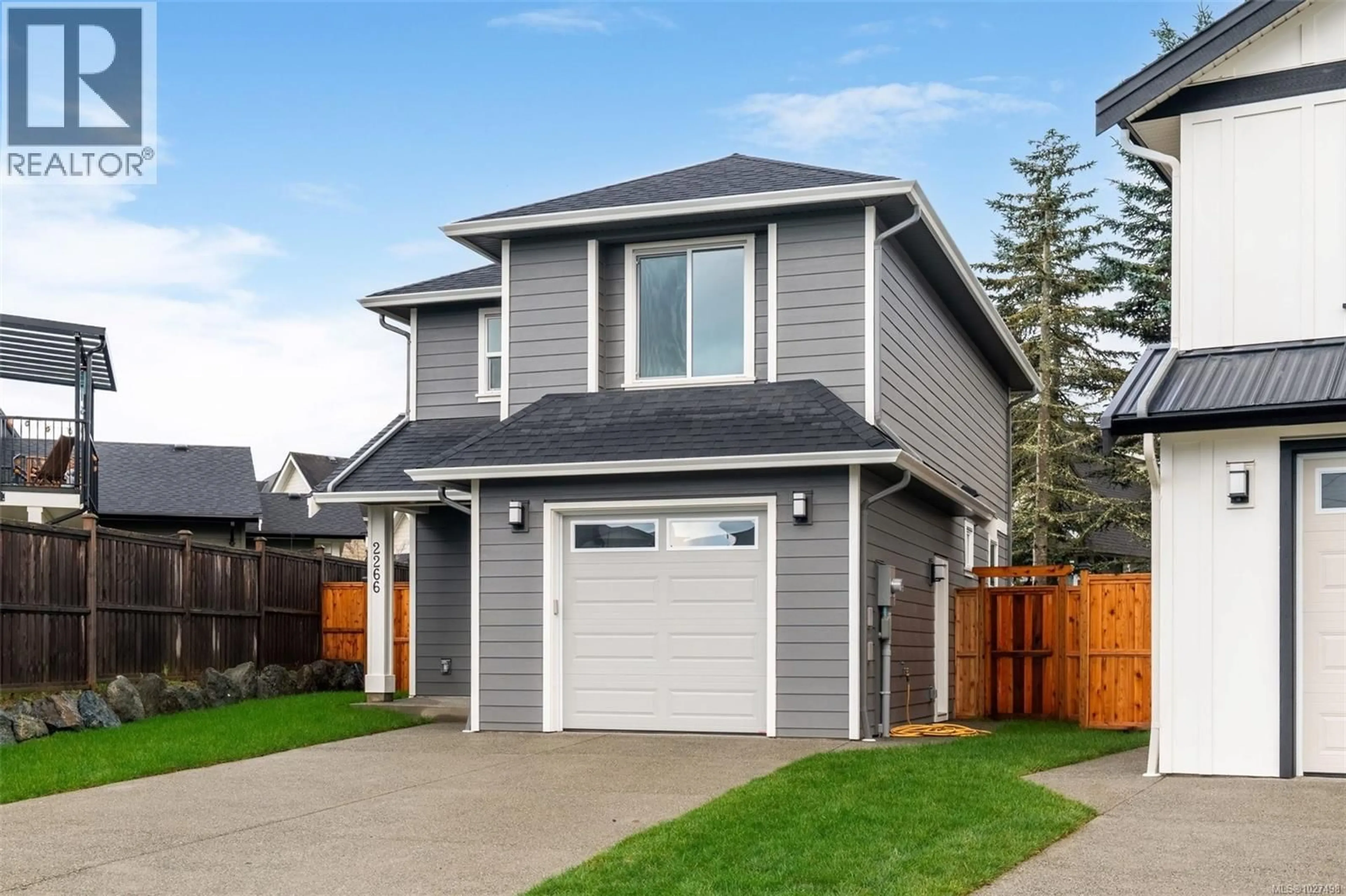 Home with vinyl exterior material, street for 2266 EVELYN LANE, Sooke British Columbia V9Z0W3