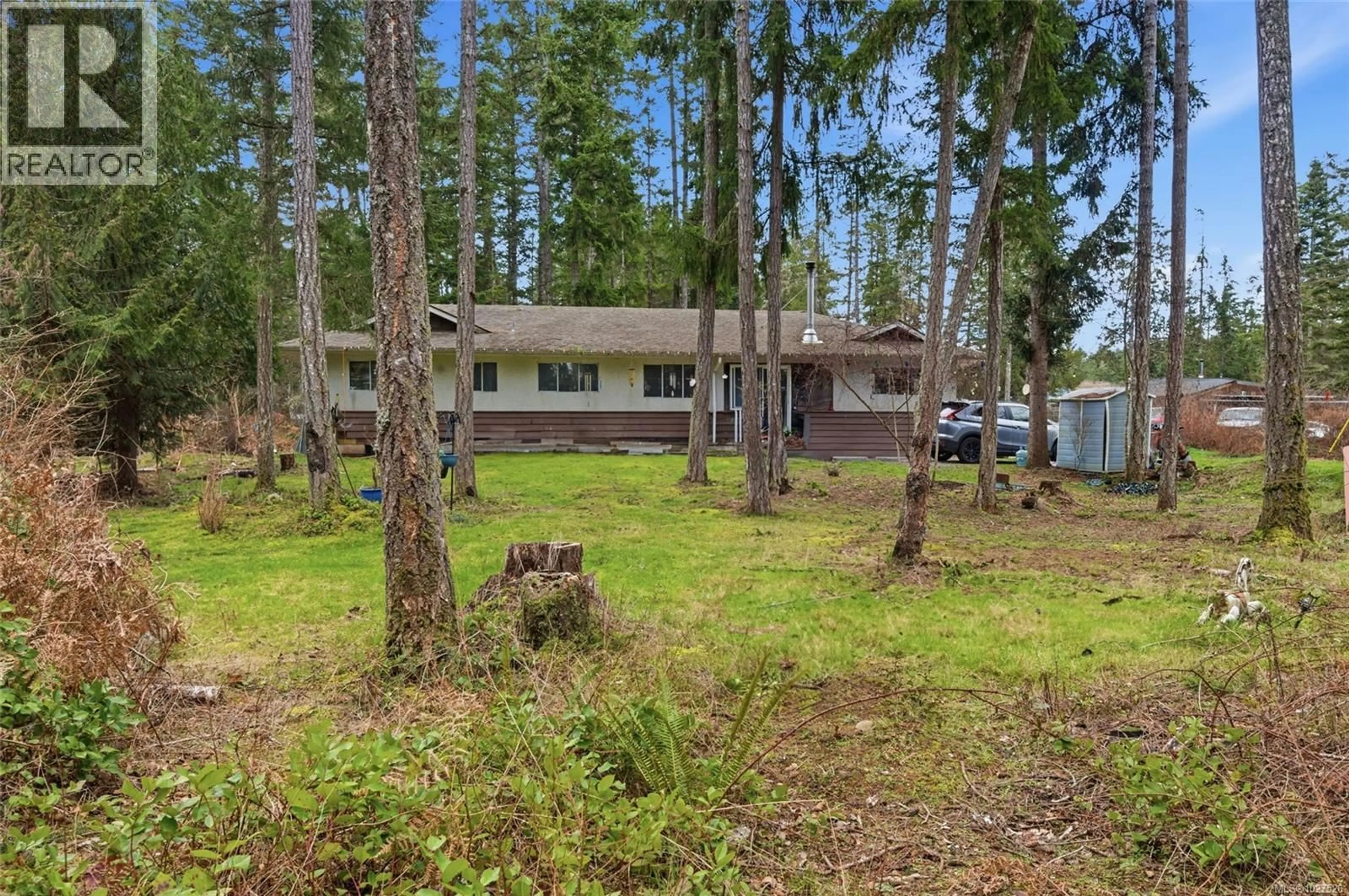 A pic from outside/outdoor area/front of a property/back of a property/a pic from drone, forest/trees view for 2187 BURGOYNE ROAD, Coombs British Columbia V0R1M0