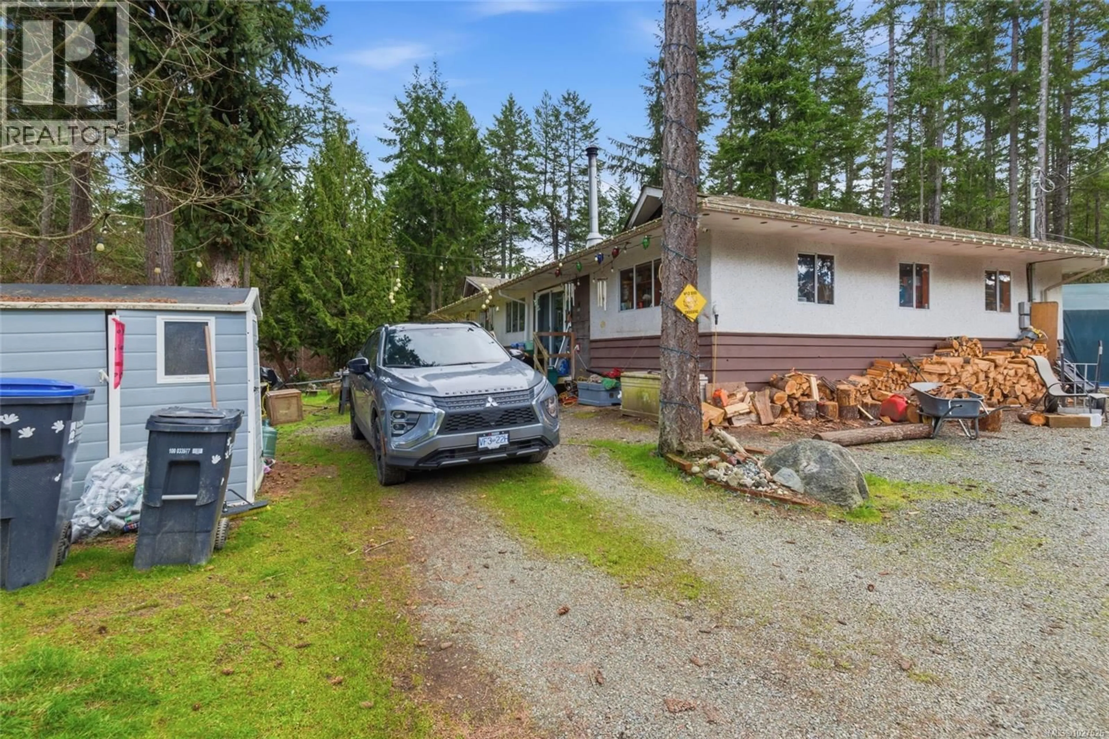 A pic from outside/outdoor area/front of a property/back of a property/a pic from drone, unknown for 2187 BURGOYNE ROAD, Coombs British Columbia V0R1M0