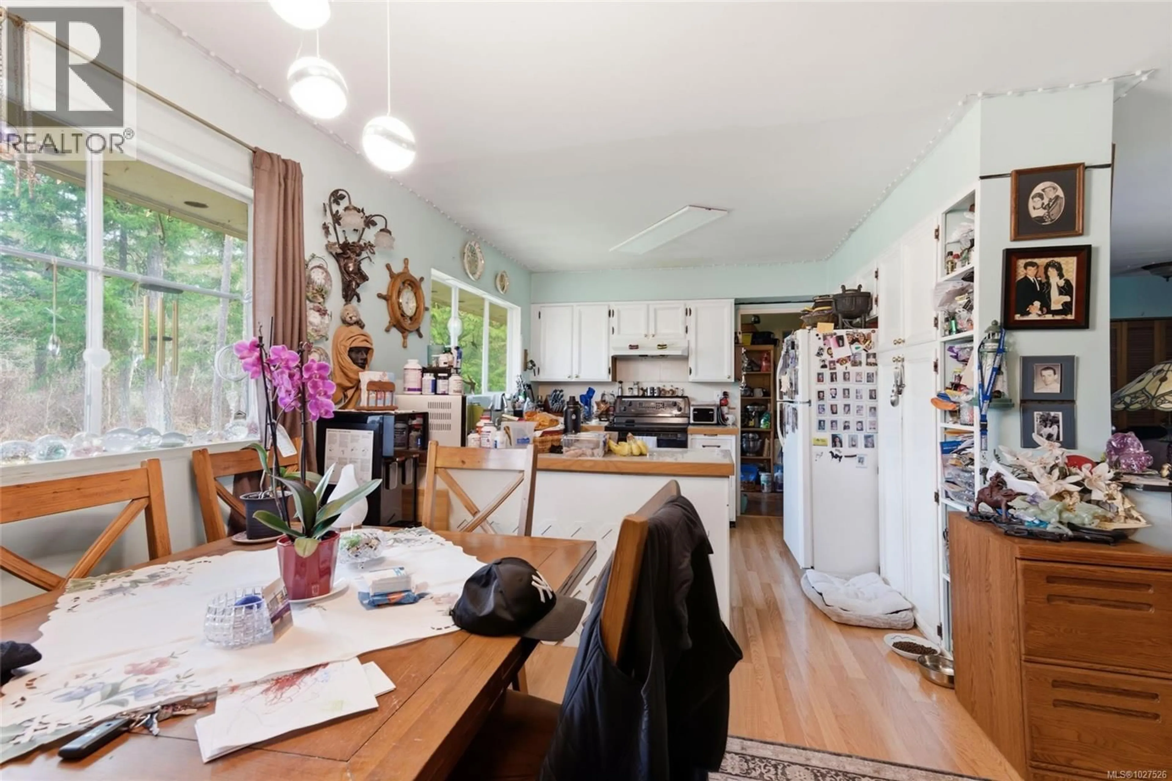 Dining room, wood/laminate floor for 2187 BURGOYNE ROAD, Coombs British Columbia V0R1M0