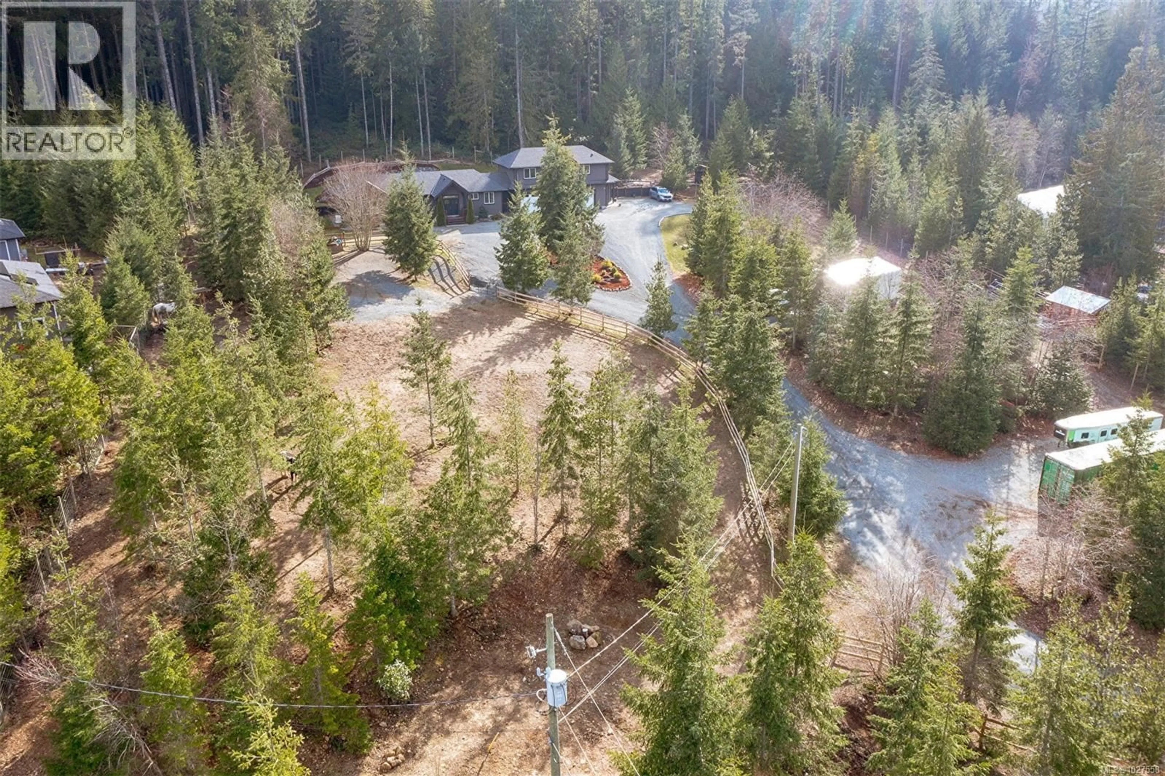 A pic from outside/outdoor area/front of a property/back of a property/a pic from drone, forest/trees view for 2840 WOODCROFT PLACE, Shawnigan Lake British Columbia V0R2W1